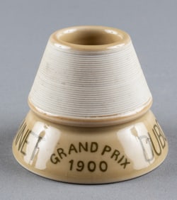 GRAND PRIX 1900 DUBONNET CERAMIC MATCH STRIKER