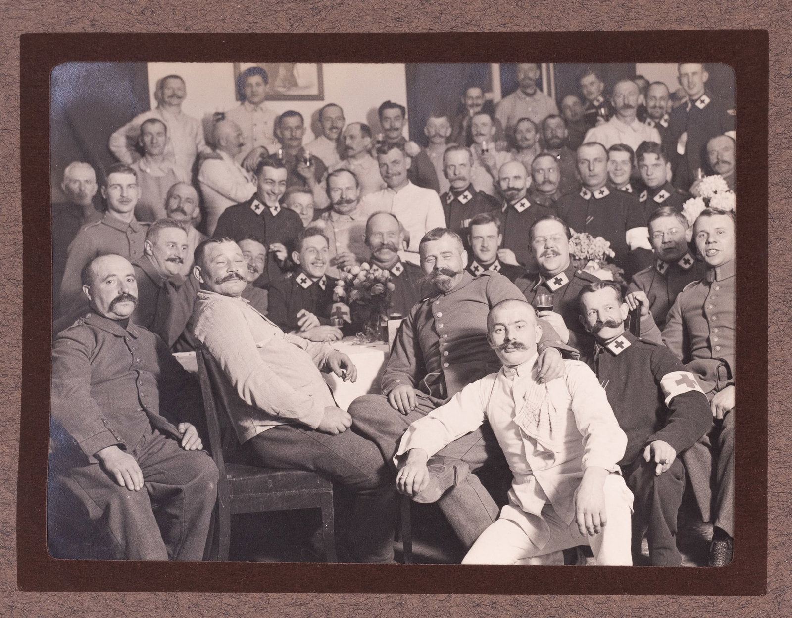 WWI GERMAN SOLDIERS IN BELGIUM PHOTO ALBUM: WWI German soldier's photo album, approx. 48 photographs of German soldiers recovering from battlefield injuries in a hospital in occupied Belgium, photographs of nurses, staff, and officers, ruins in