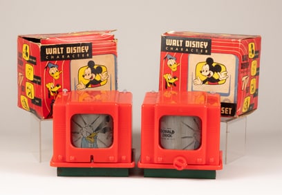 TWO BOXED WALT DISNEY CHARACTER TV SET WIND-UP TOYS