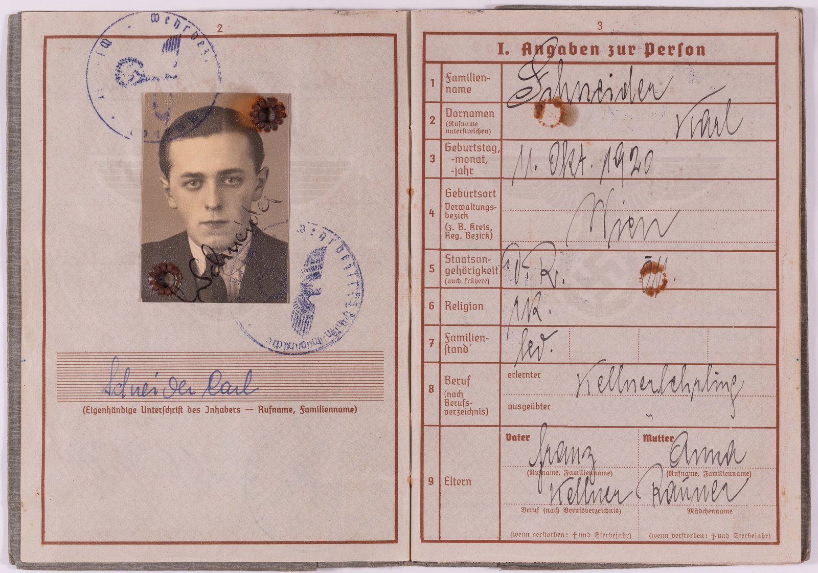 WWII GERMAN LUFTWAFFE WEHRPASS [KARL SCHNEIDER]: WWII German Luftwaffe Wehrpass for Karl Schneider, born 11.10.1920 in Viena. Joined the Luftwaffe on 15.10.1939, as a part of Luftn. Ers. Kamp. 18/17. Service from 1939 to 1942 included, which feature