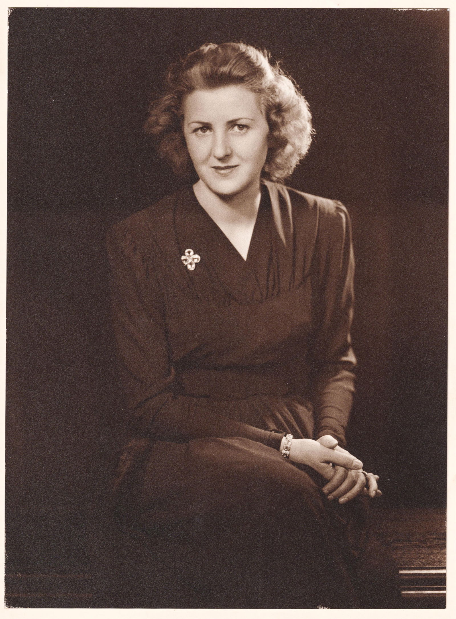 2 ORIGINAL EVA BRAUN HOFFMAN PRINTS: Two original professional studio portraits of a young Eva Braun, taken by Heinrich Hoffman, Adolf Hitler's official photographer, in his photo studio sometime between the 1930s and 1940s. The photogra