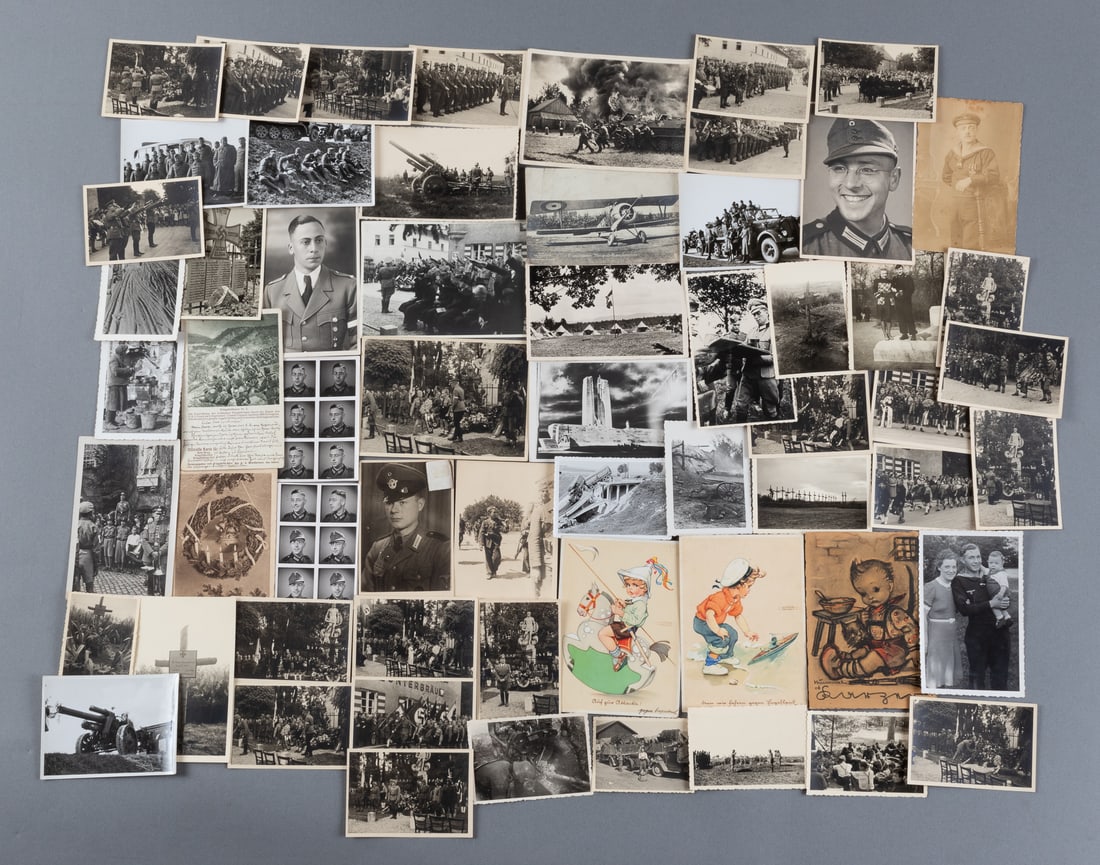 60 WWII GERMAN PHOTOGRAPHS: Sixty WWII German b/w photographs and postcards, including photographs of a funeral, Hitler Youth photos, photos of the battlefield, three photo collages of a German soldier, and more. Also includes t
