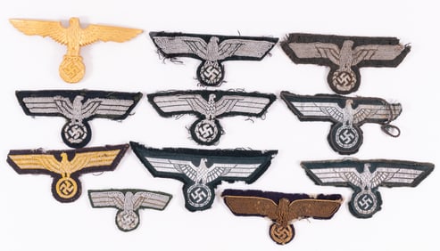 11 WWII GERMAN HEER EAGLE INSIGNIA