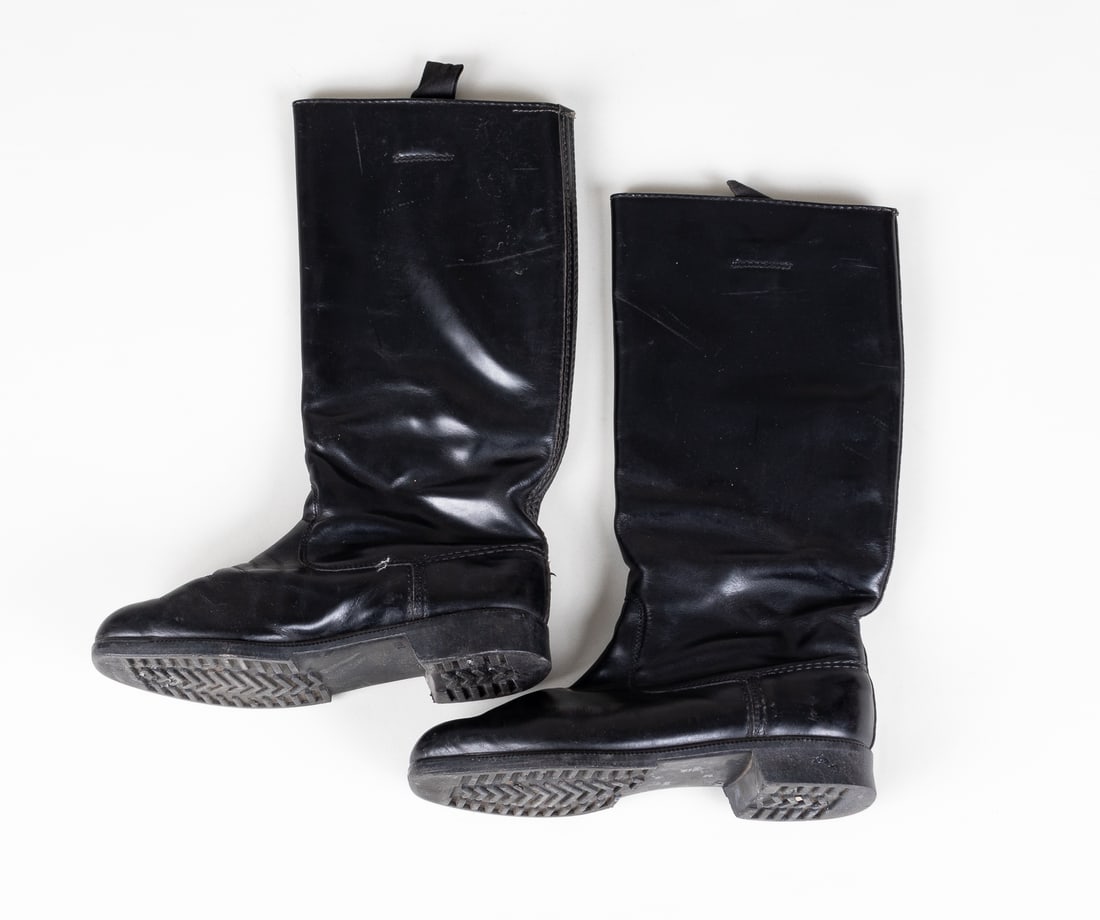 WEHRMACHT PESCHEL COMBAT BOOTS: Pair of Wehrmacht Peschel leather combat marching boots, with rubber soles, on the sole is stamped '27 1/2' for size. Inside the boots is stamped 'PESCHEL 27 1/2'. 15.25 inches tall.