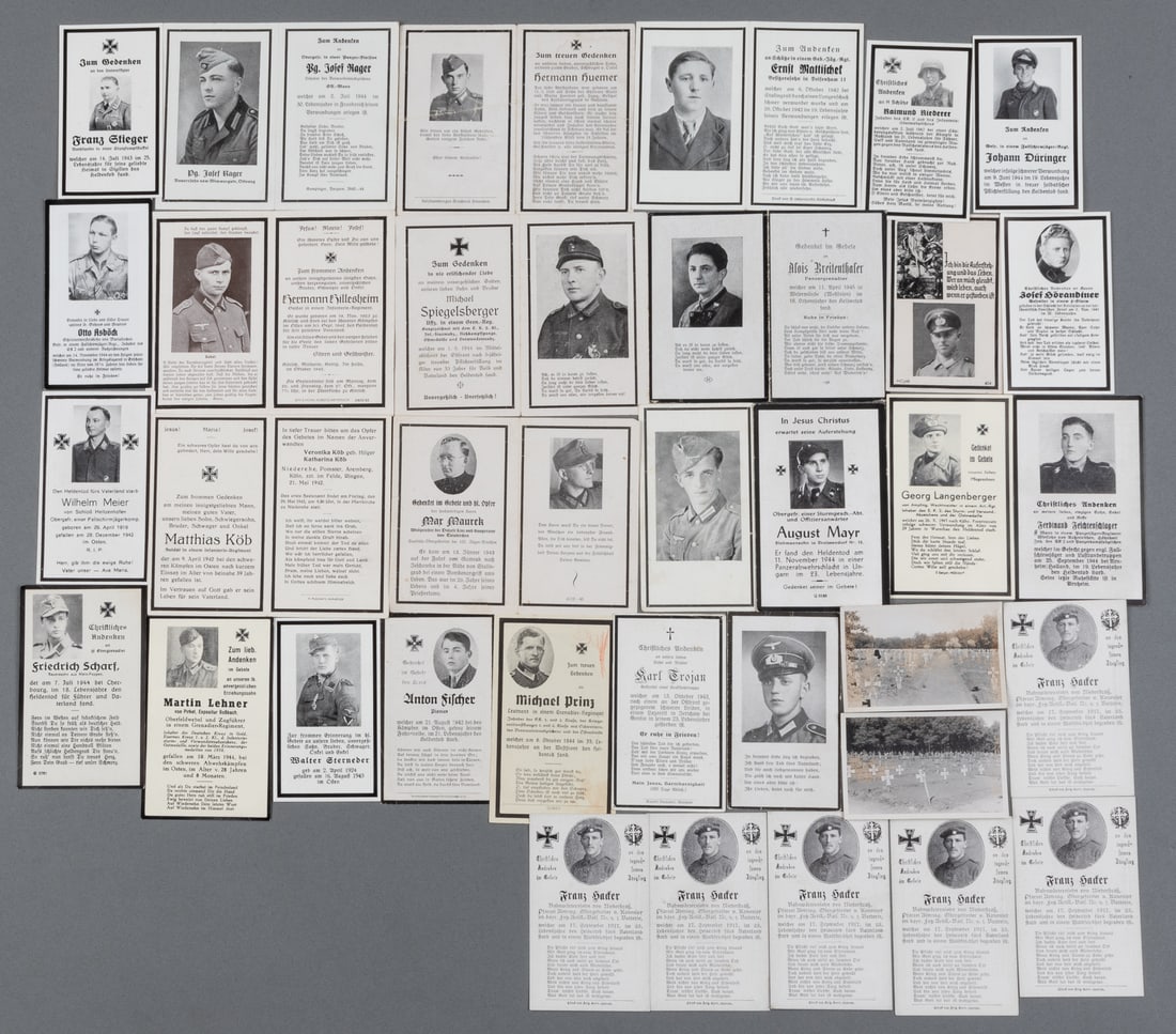 32 WWII GERMAN DEATH CARDS [SS, LUFTWAFFE, INFANTRY]: Thirty-two WWII German death cards, including five for Waffen-SS soldiers, two for Panzer soldiers, one wearing his Panzer cap in the photo, four for Luftwaffe soldiers, and fifteen for infantry soldi