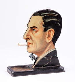 DICK TRACY MAN'S HEAD TIN CIGARETTE DISPENSER