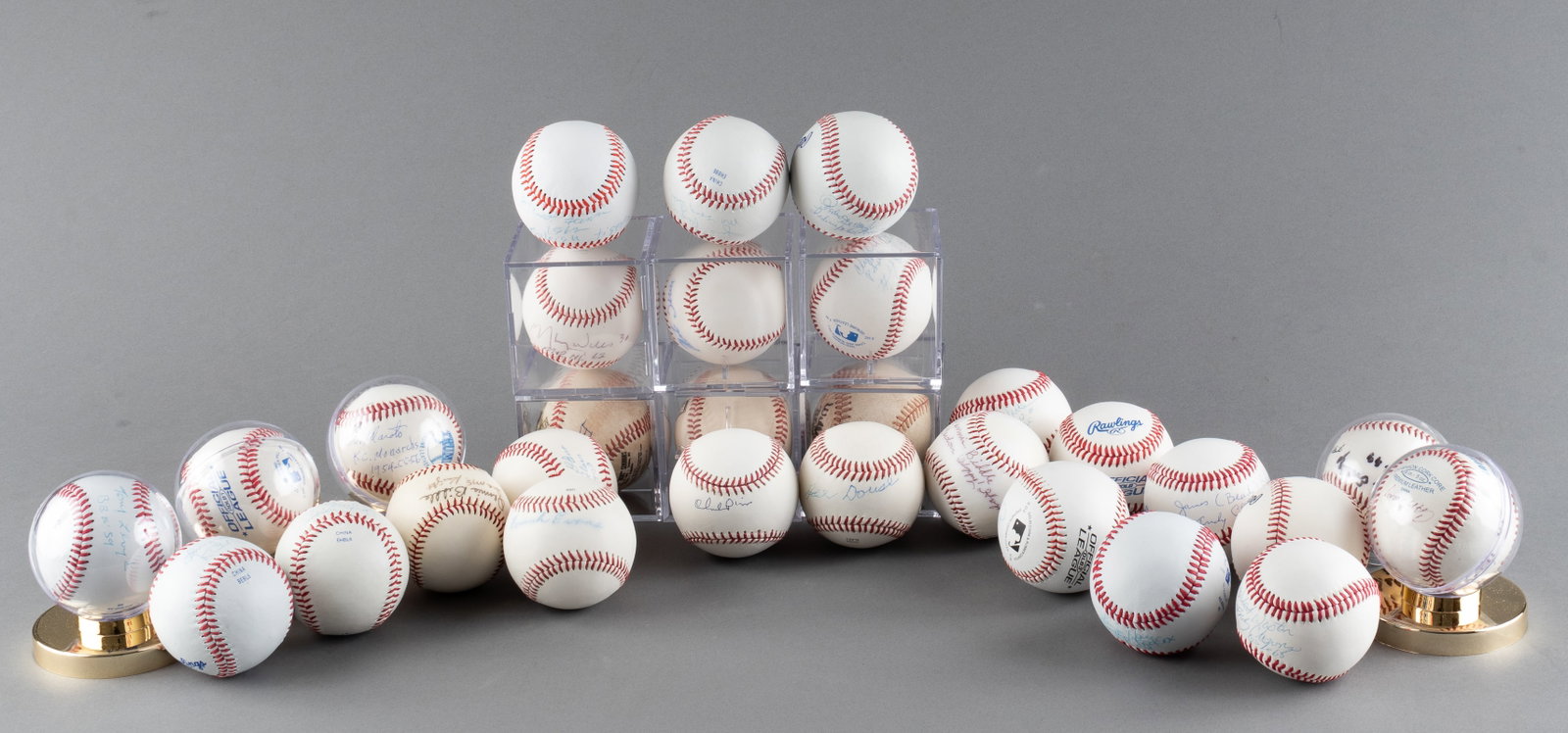 29 NEGRO LEAGUE BASEBALL PLAYERS SIGNED BASEBALLS: Twenty-nine baseballs signed by Negro League Baseball players. Twenty-five balls signed individually by players including autographs from Carl Holden (b. 1941), Maury Willis (1932-2022), Hubert Simmon