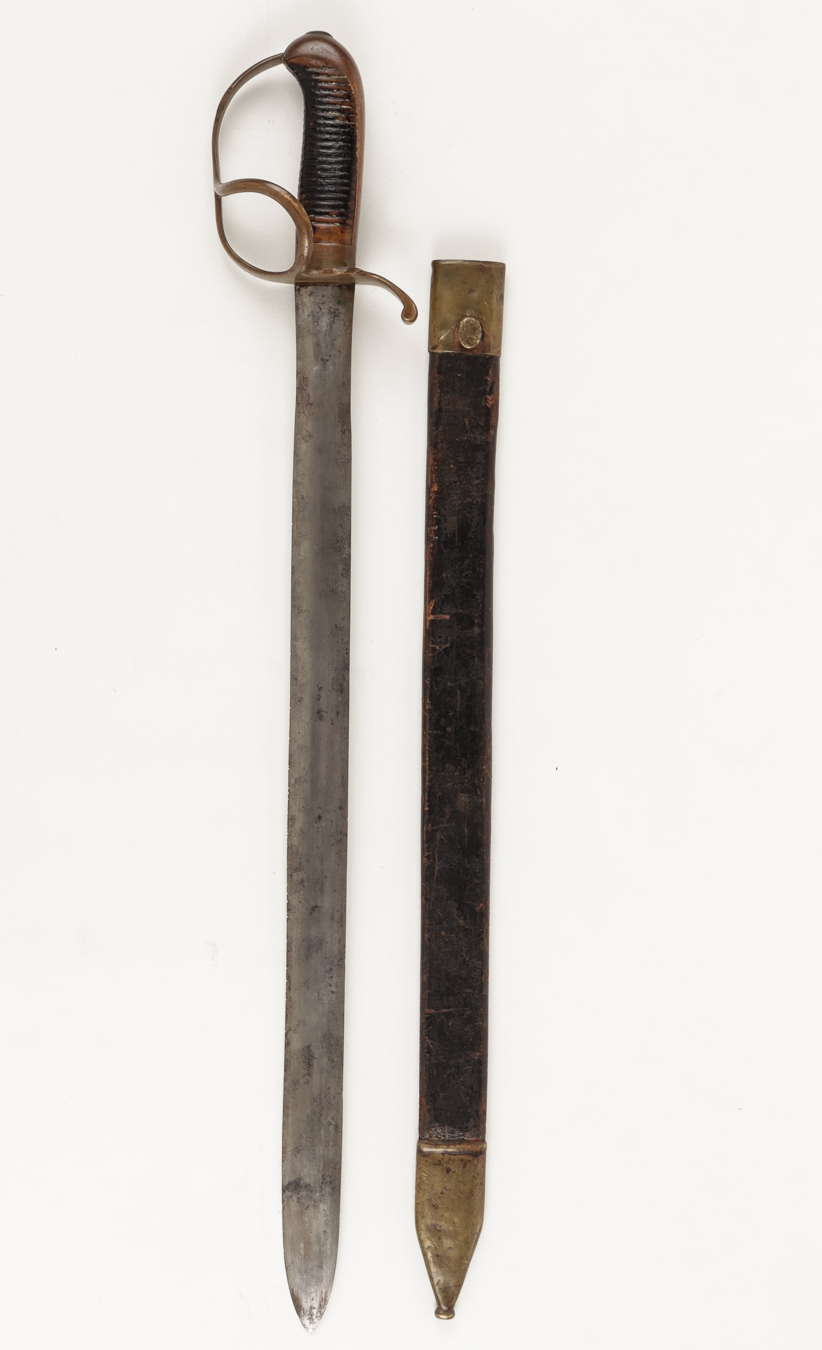 ANTIQUE BRITISH NAVAL CUTLASS WITH SCABBARD: Antique British naval cutlass with scabbard, marked on the ricasso 'T' above a crown for its inspection, and marked '2' on the quillion, with a brass handgrip and knuckle guard, and a leather and bras