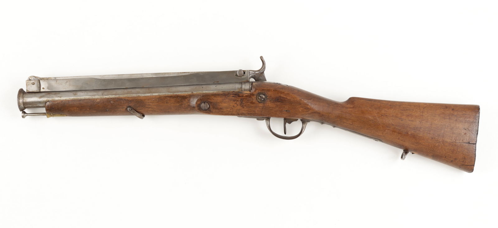ANTIQUE BRITISH PERCUSSION BLUNDERBUSS W/ BAYONET: Antique British style blunderbuss with spring-loaded bayonet and percussion cap conversion, also called a 'musketoon,' no makers marks visible, marked on the left side of the stock '38.' Spring-loaded