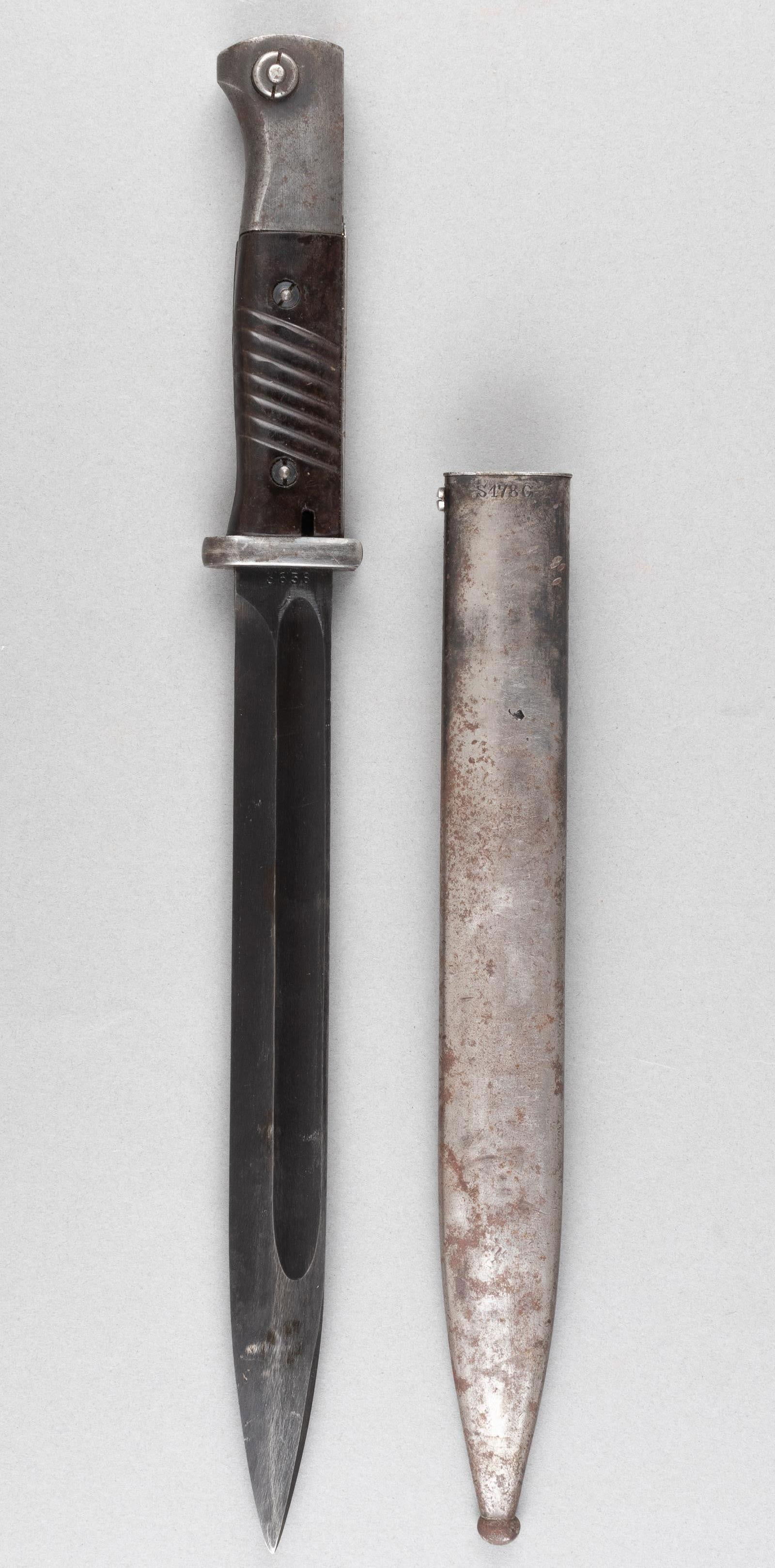 WWII FRENCH K98 BAYONET BY JWN: WWII French-made K98 bayonet, marked on the ricasso 'JWN' for maker Staatliche Waffenfabrik, Chatellerault, serial no. 3638. With a steel scabbard, mismatched serial no. 4029, also marked S178G on the