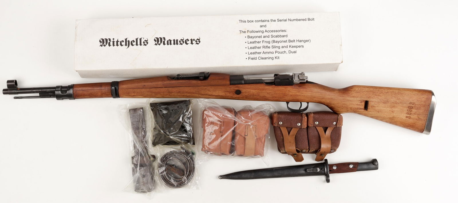 YUGOSLAVIAN M48 MAUSER 8MM BOLT ACTION RIFLE: Yugoslav M48 Mauser 8mm bolt-action rifle, marked on the top of the receiver, Cyrillic writing stamped on the left side of the receiver, serial number 38983 stamped on the upper receiver, lower receiv
