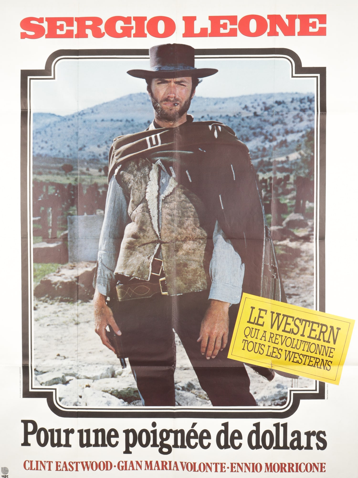 FIST FULL OF DOLLARS VINTAGE FRENCH 1-PANEL POSTER: Fist Full of Dollars [Pour une Poignee de Dollars] vintage 1-panel poster, from the 1970s rerelease, features a portrait shot of Clint Eastwood as the Man with No Name. Poster with folds, splits in fo