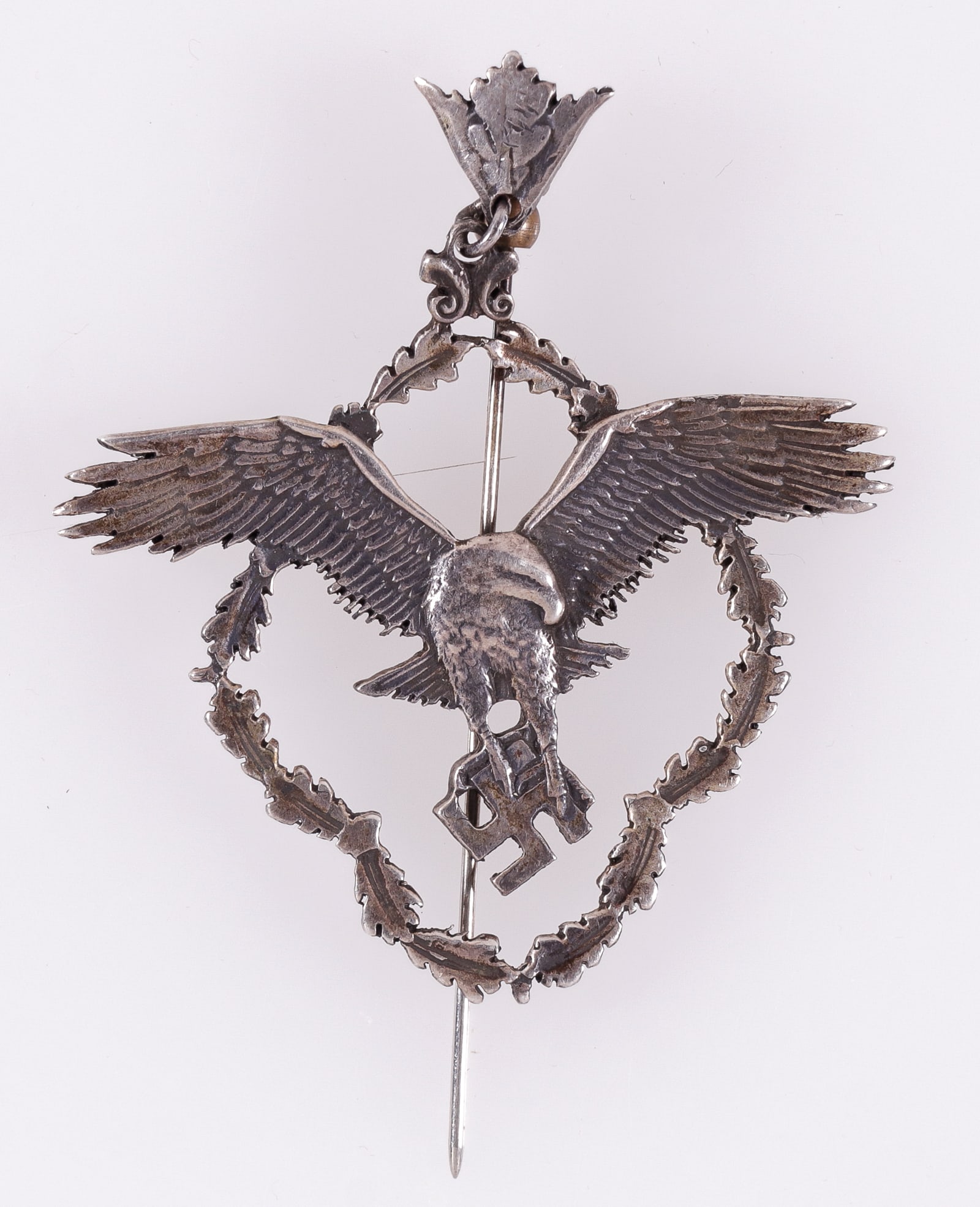 WWII GERMAN ACADEMY FOR AERONAUTICAL RESEARCH MEMBERSHIP BADGE: WWII German Academy for Aeronautical Research membership badge in silver, numbered on the back '82,' marked '90' for silver plate, and maker marked 'LN1790' for maker Lauer Georg AG, Pforzheim. The me
