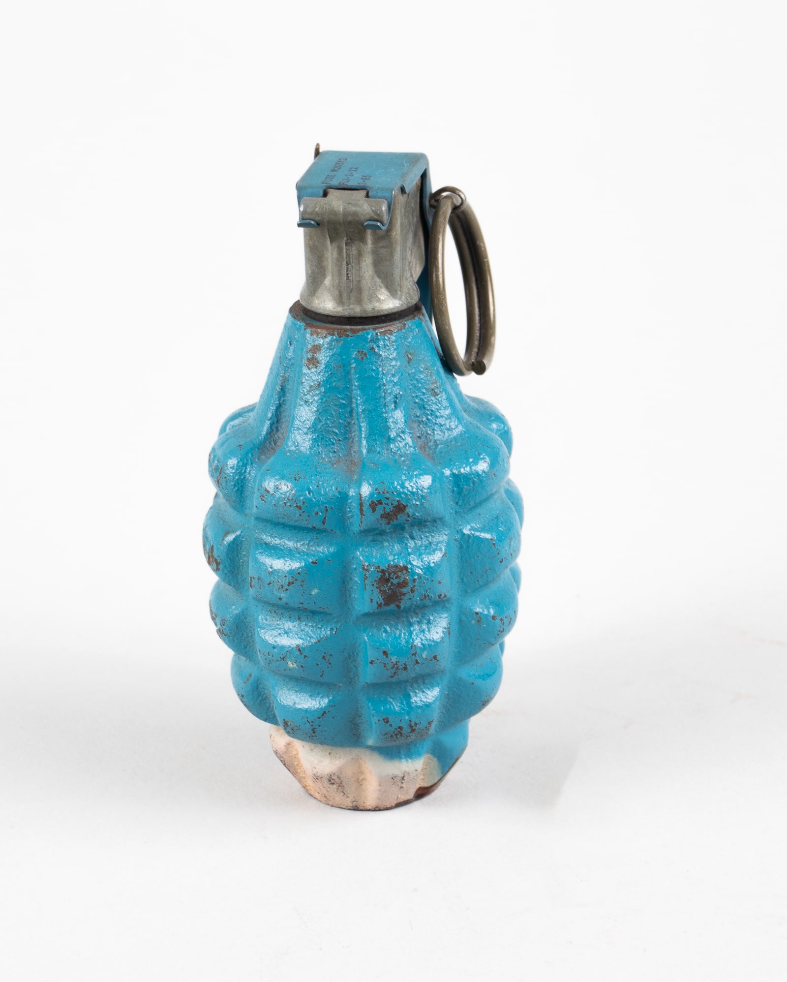 VIETNAM WAR ERA MK 2 PINEAPPLE PRACTICE GRENADE: Vietnam War era MK 2 pineapple grenade, used as practice for soldiers when throwing grenades. Inert with a hollow center.