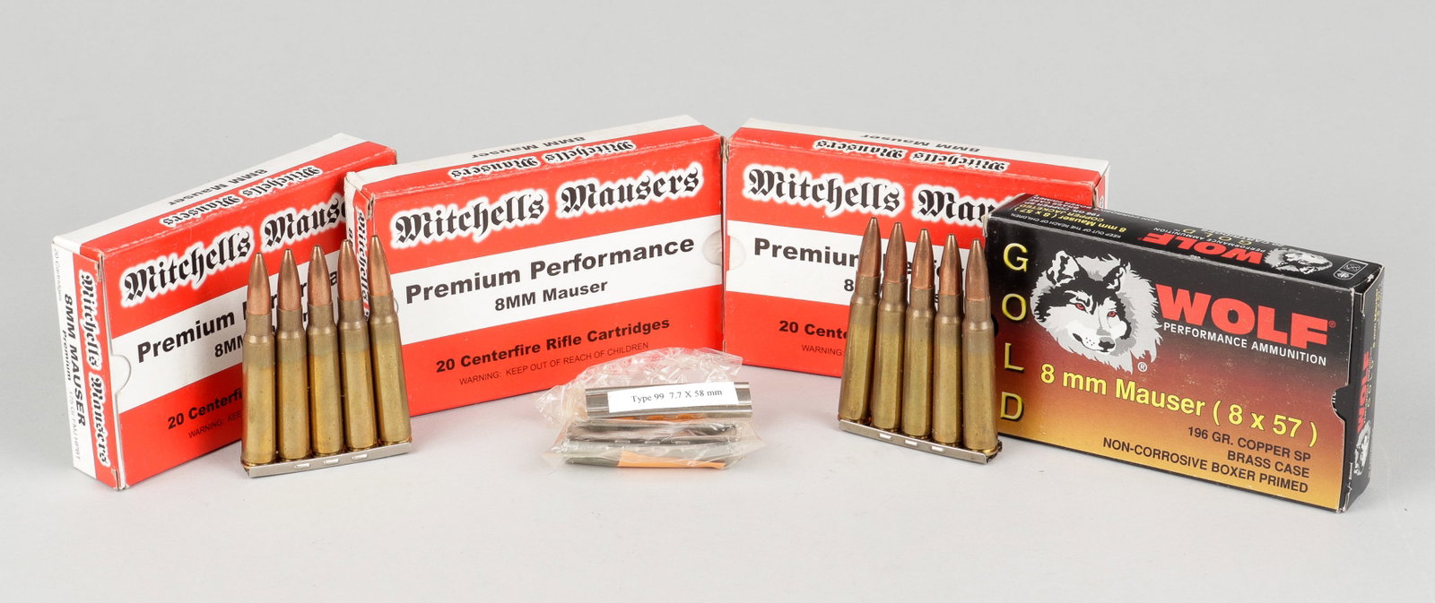 90 8MM MAUSER ROUNDS W/ STRIPPER CLIPS: 90 8mm Mauser rounds, including 70 Mitchel's Mausers Premium Performance rounds, and 20 Wolf Gold rounds, also with 6 compatible stripper clips.