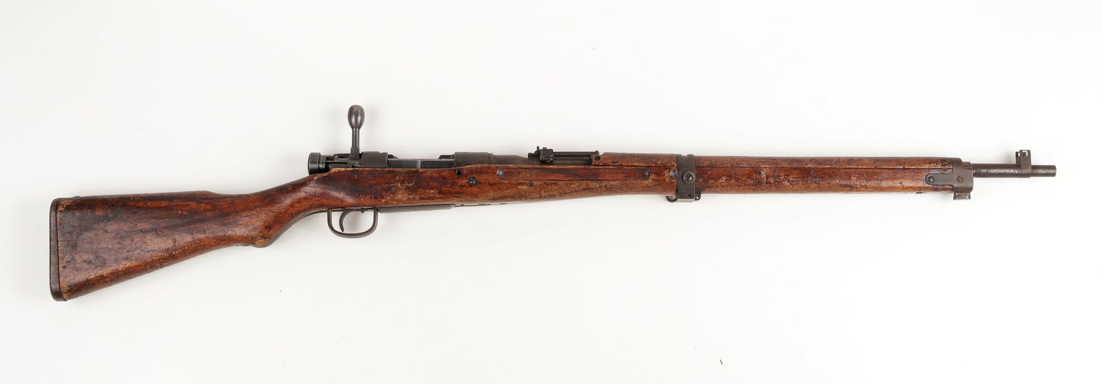RARE HOWA JYUKO SERIES 9 ARISAKA TYPE 99 RIFLE: Rare Arisaka Type 99 7.7mm rifle, series 9 by Howa Jyuko arsenal, Japanese insignia on the top of the receiver has been ground off, the serial number is marked on the left side of the receiver, '8335.