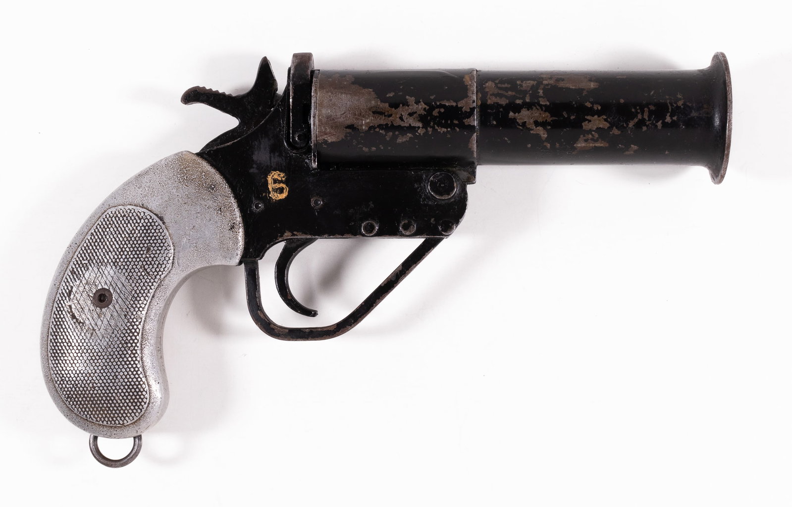 ORIGINAL BRITISH WWII WEBLEY NO.1 MK 5 FLARE SIGNAL PISTOL WITH ALUMINUM GRIP: Original WWII British No. 2 Mark 5 signal pistol with aluminum hand grip, retractable carry loop, and black metal frame. Matching serial numbers on the barrel and frame '055567.' Worn paint from use. 