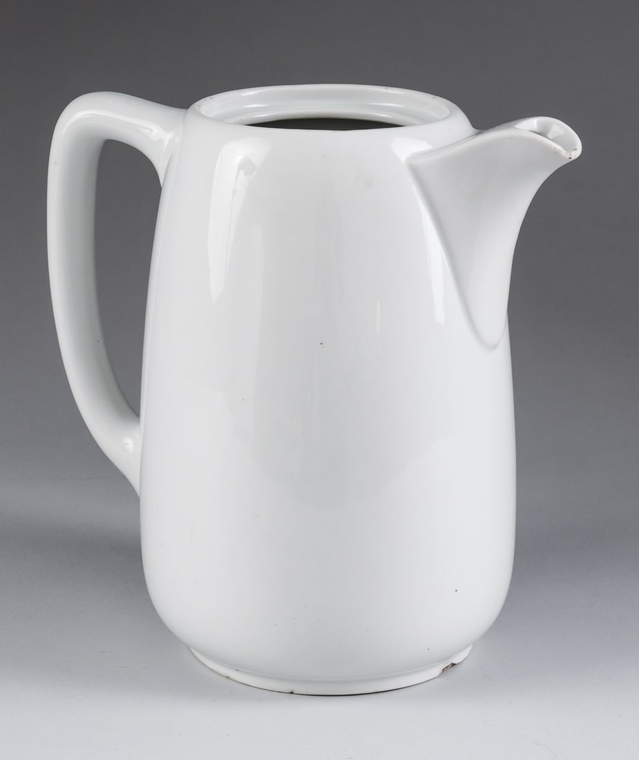 WWII NAZI GERMAN ARMY PORCELAIN WATER PITCHER / COFFEE POT: WWII Nazi German army heavy porcelain mess hall pitcher, stamped on the bottom 'Bauscher, Weiden,' dated 1942, with a stamp of a Nazi eagle, missing the lid. Light chip at the spout. A