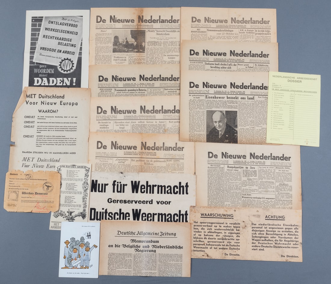 WWII GERMAN PROPAGANDA PAPERS IN DUTCH: WWII German-occupied Netherlands ephemera, including nine De Nieuwe Nederlander newspapers, two paper warning signs, and other leaflets and postcards. 19 pieces total. Pieces may have tears, chipping,
