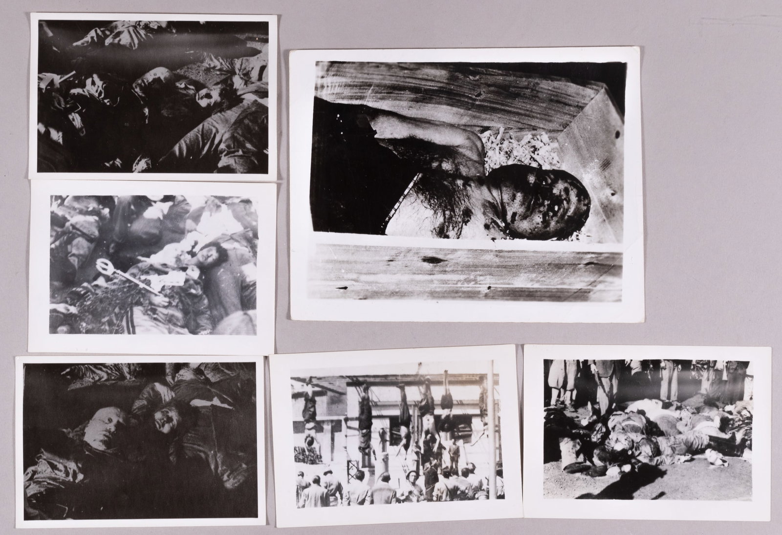 6 BENITO MUSSOLINI EXECUTION PHOTOS: Six Benito Mussolini execution photos, including the photo of Mussolini with his mistress, the photo of Mussolini in his casket, each photo features the previous Italian dictator's body desecr