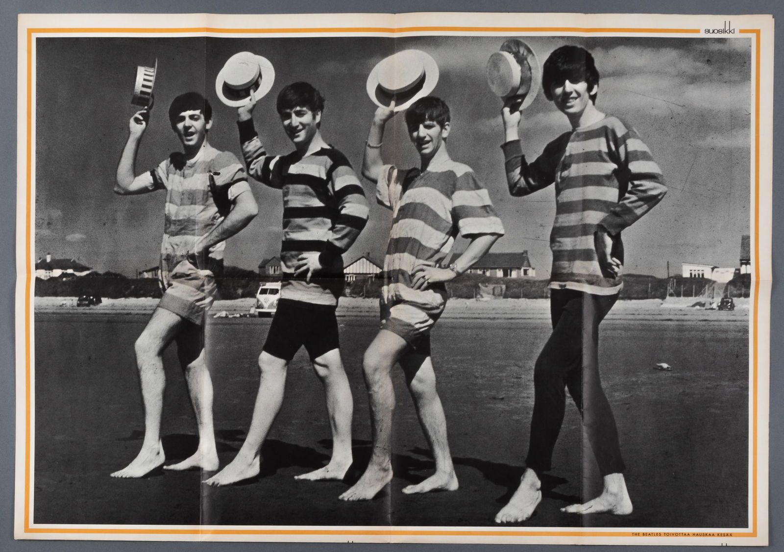 THE BEATLES POSTER: Finnish poster for The Beatles, one full page photograph of the Beatles on the beach, known as the 'Bathing Beatles,' created by photographer Dezo Hoffman in 1963. The image shows John Lennon, Paul