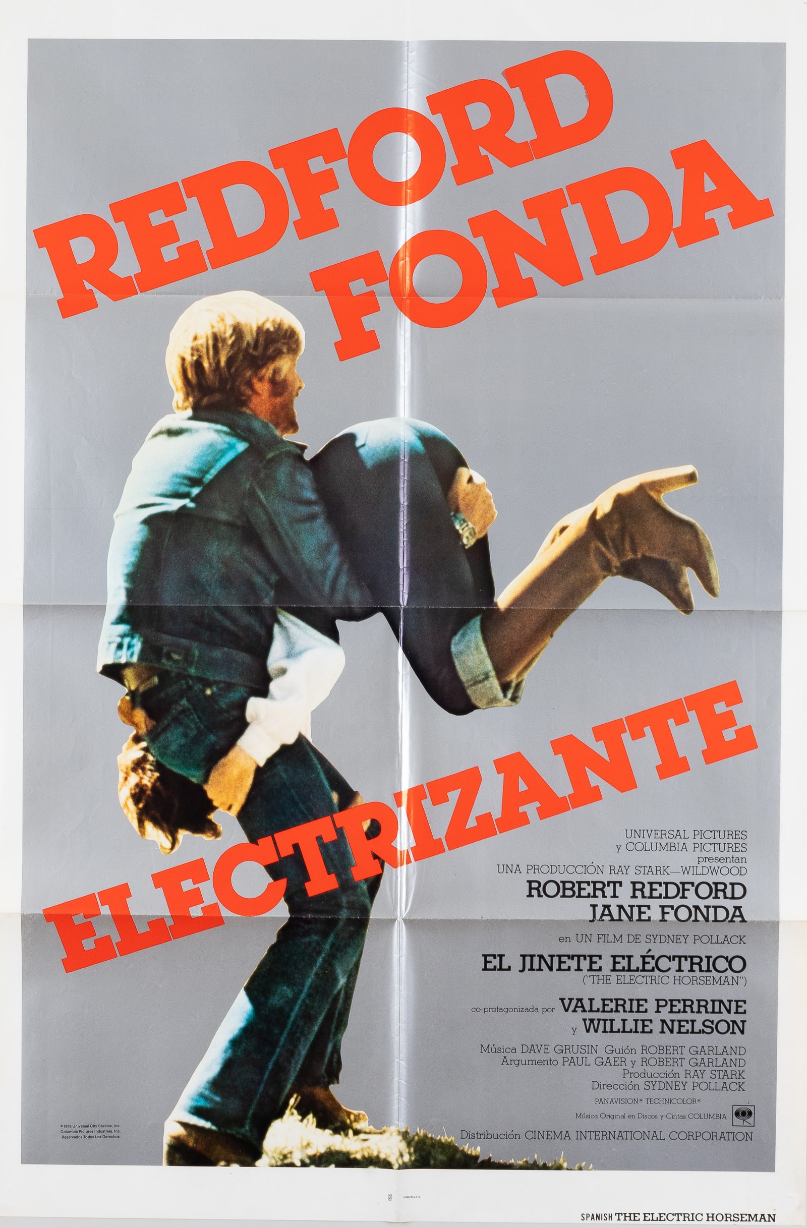ROBERT REDFORD - JANE FONDA - THE ELECTRIC HORSEMAN SPANISH MOVIE POSTER: Spanish 1979 one-sheet movie poster for 'The Electric Horseman' (1979), starring Robert Redford and Jane Fonda. Folded, size 27 x 41 inches. Very good.