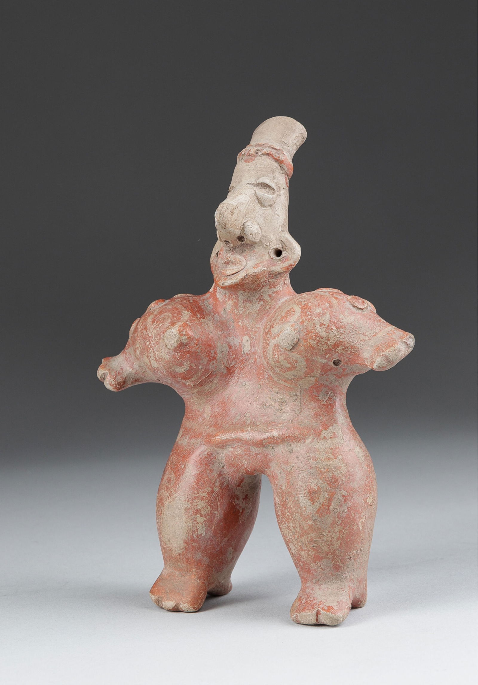 PRE-COLUMBIAN JALISCO POTTERY STANDING FIGURE: Pre-Columbian Jalisco pottery of a standing figure, 7.5 x 5.5 x 1.25 inches. From the collection of G. Theofiles.