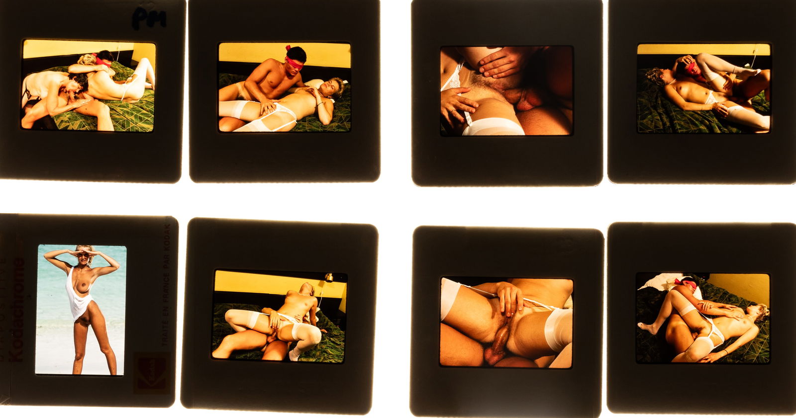 57 VINTAGE EROTIC SCENE PHOTO SLIDES NUDE ADULT SLIDES: Fifty-seven vintage nude erotic scene color photo slides, 1980s-90s.
