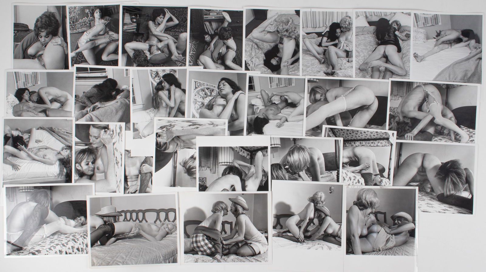 30 VINTAGE ADULT EROTIC LESBIAN PHOTOGRAPHS: Thirty vintage b/w adult lesbian erotic photographs, all from professional scenes, likely intended for magazine publishing, all with performer names on the reverse, two with crop marks and instruction