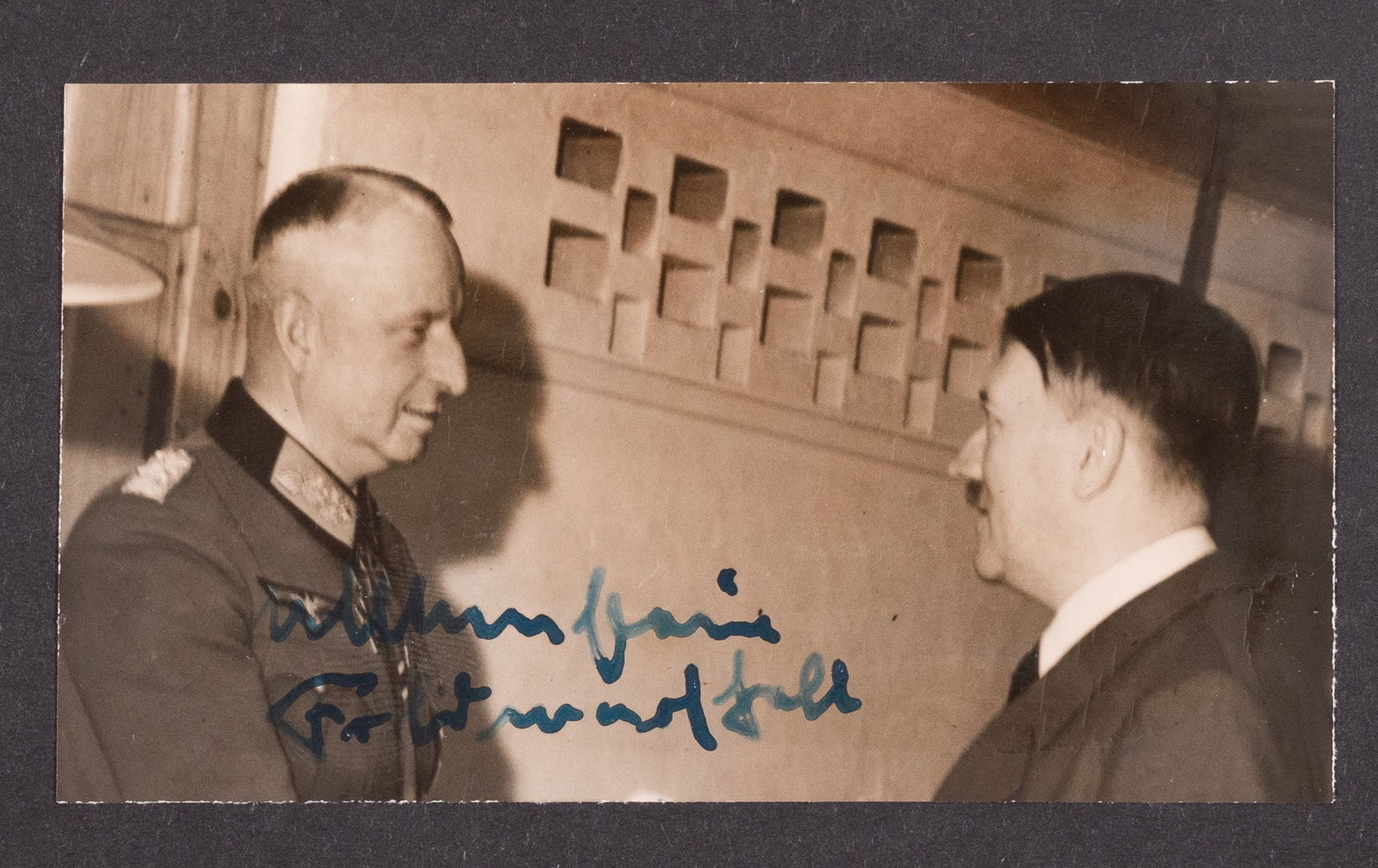 ERICH VON MANSTEIN: Erich von Manstein (1887-1973) German Generalfeldmarschall of the Heer, Hitler chose Manstein's plan for the invasion of France. Signed b/w photograph of Manstein with Hitler, affixed on a cut black a