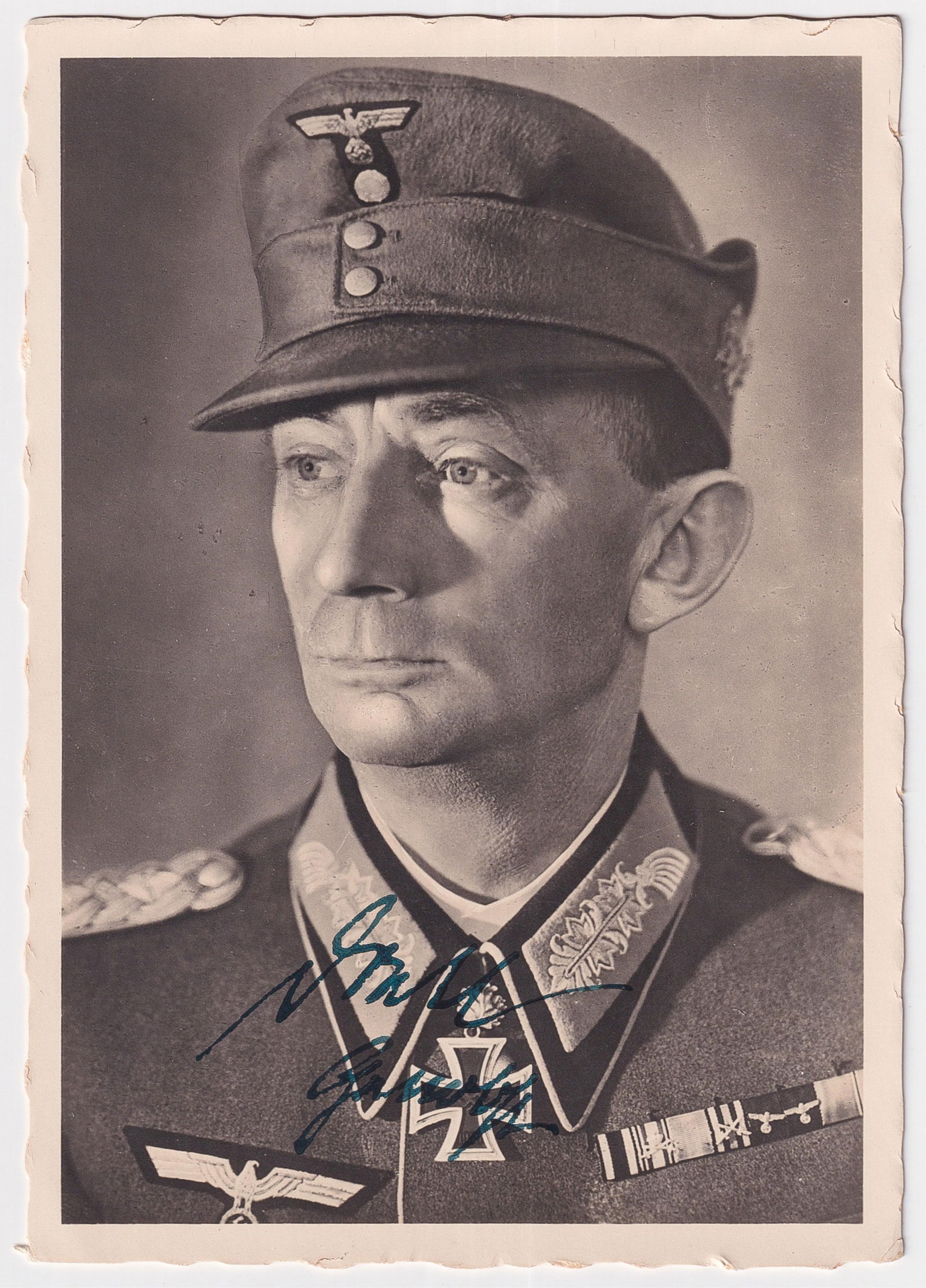 GENERALOBERST EDUARD DIETL: Eduard Dietl (1890-1944) General in the Heer, recipient of the Knight's Cross of the Iron Cross with Oak Leaves and Swords, and commander of the 20th Mountain Army. B/w sepia postcard, signed along hi