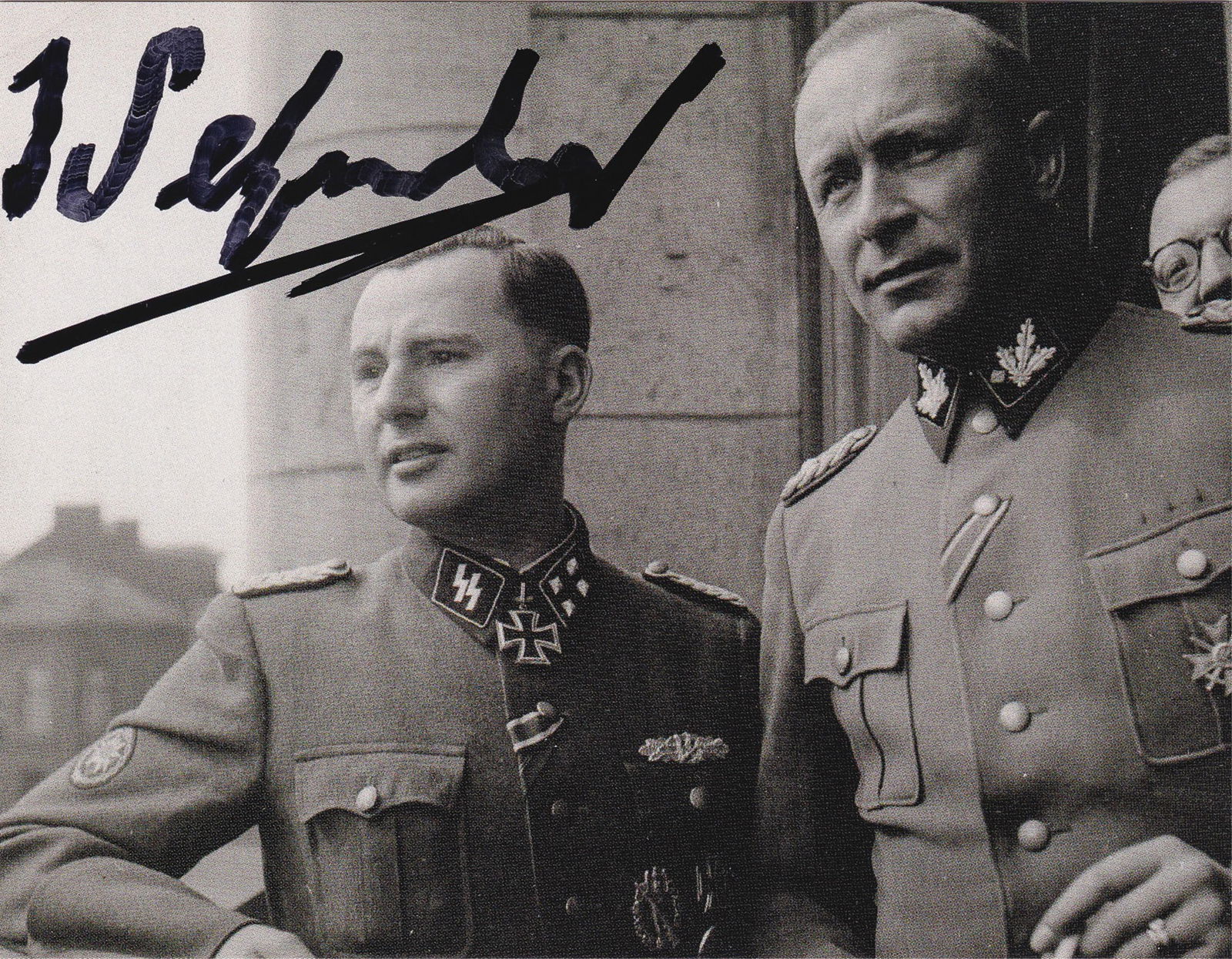 LEON DEGRELLE: (1906-1994) Belgian politician, SS-Standartenfuhrer, political leader of the Walloon Legion, recipient of the Knight's Cross of the Iron Cross with Oak Leaves. Signed photograph, Degrelle is on the