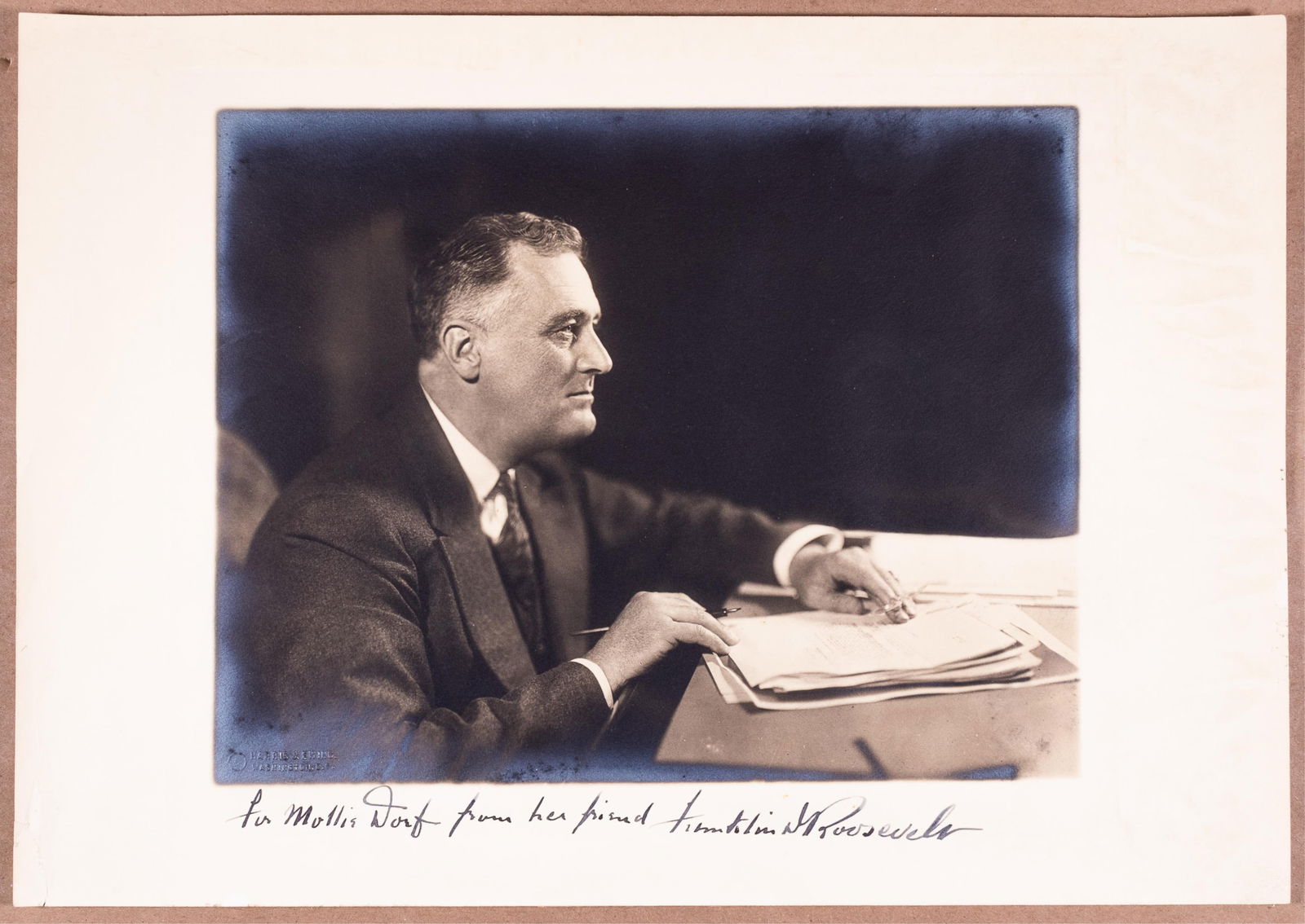 FRANKLIN D. ROOSEVELT: FRANKLIN D. ROOSEVELT (1882-1945). 32nd President of the United States, serving from 1933 until his death in 1945. Vintage black-and-white gelatin silver photograph depicting Roosevelt seated at his