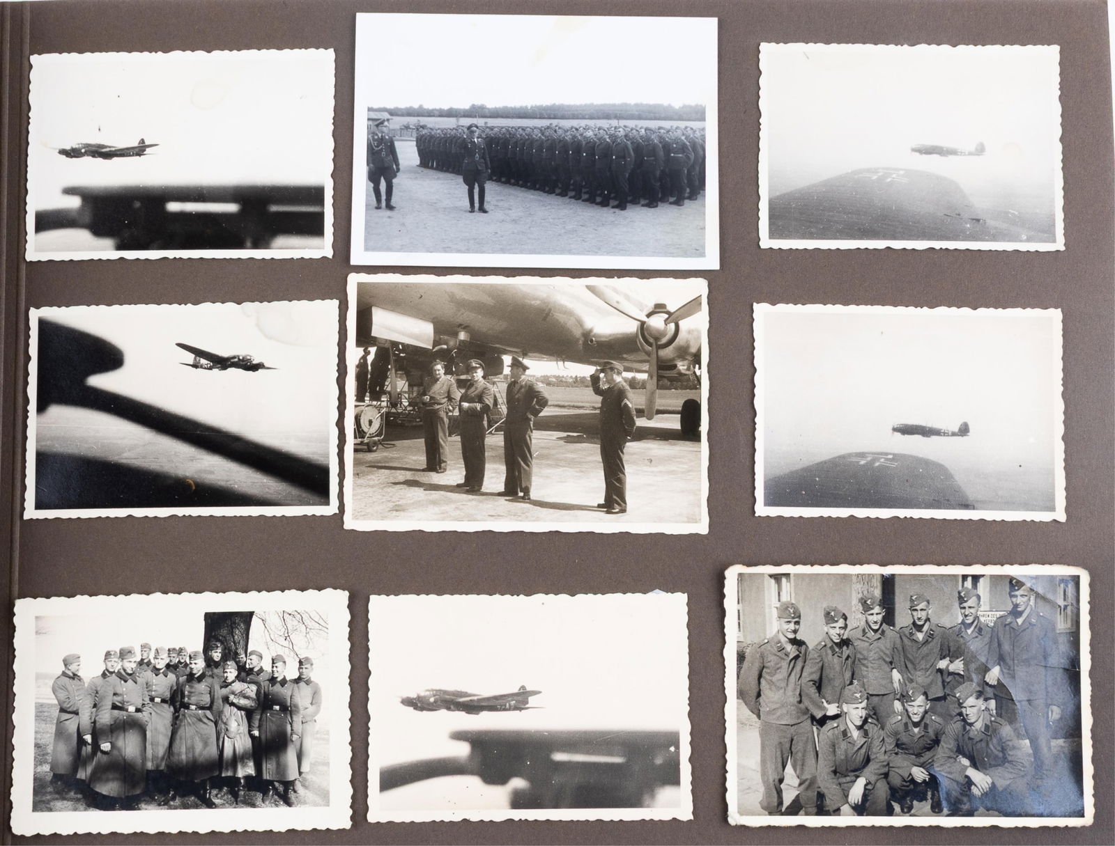 WWII GERMAN LUFTWAFFE PHOTO ALBUM [247 PHOTOGRAPHS]: WWII German Luftwaffe photo album. Including 247 black and white photos featuring Luftwaffe men in their uniforms, with their families, wedding photos, one photo showing two women in a Luftwaffe