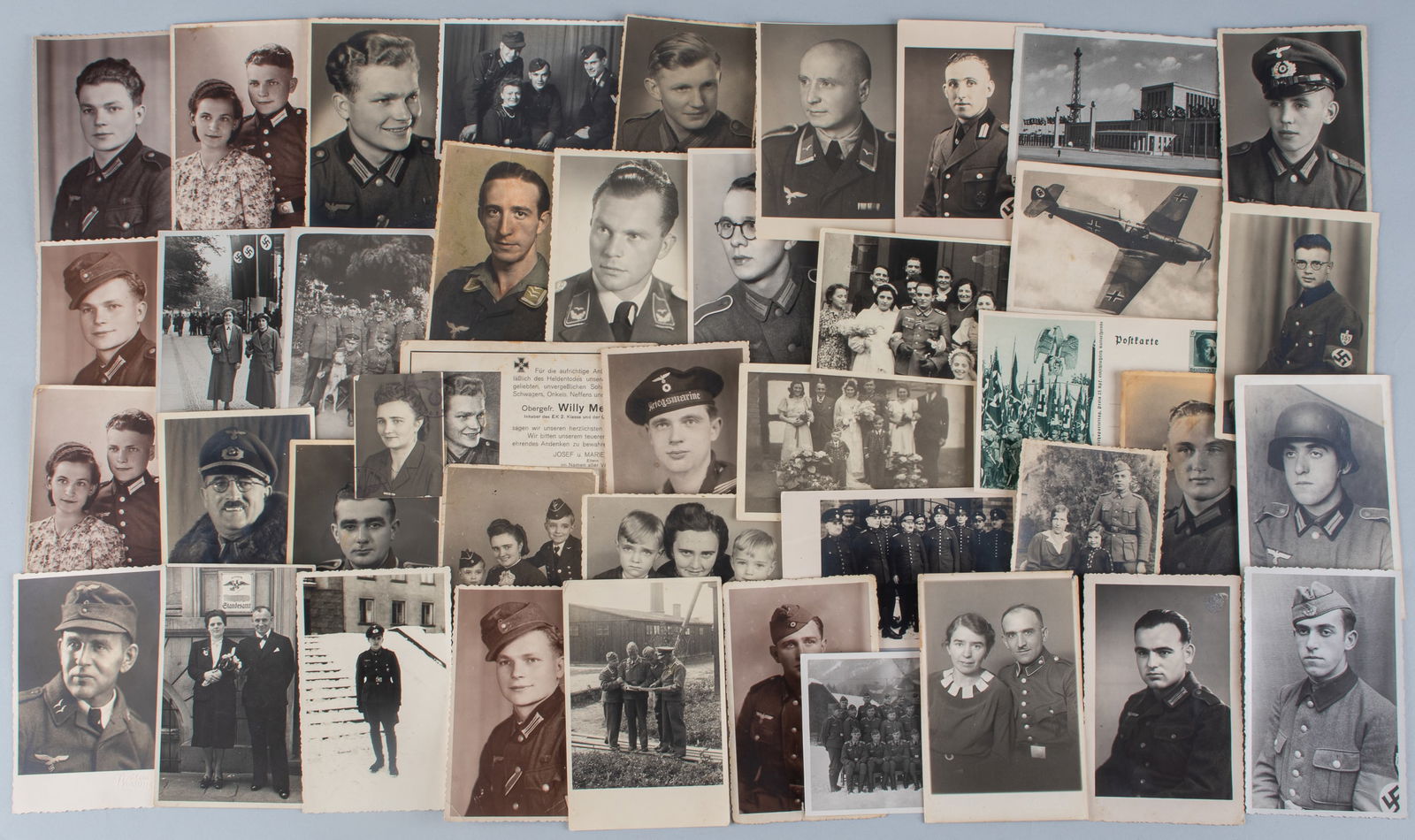 41 WWII GERMAN PHOTOGRAPHS: Forty-one WWII German b/w photographs and postcards, eight from Obergefr. Willy Merwitz, who was killed in action in 1944, includes portrait shots, a photo with his wife, and a photo with friends.