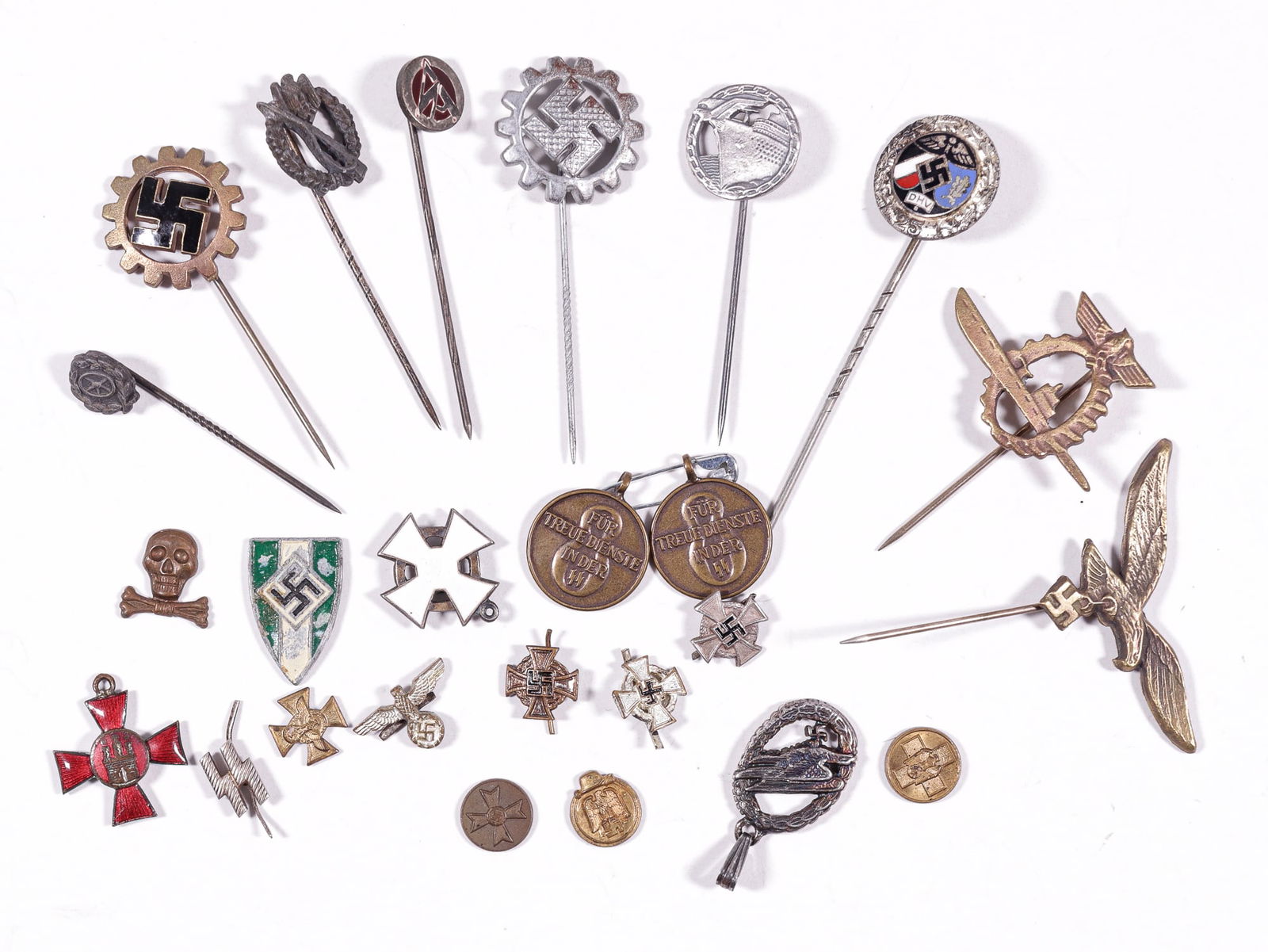 24 GERMAN NAZI STICK PINS AND MINIATURE PINS: Twenty-four German Nazi stick pins and miniature pins, including a Silver Fallschrimjager pin marked '825' for the silver content on the reverse, a DAF stick pin marked RZM M5/272, a DAF stick pin mar
