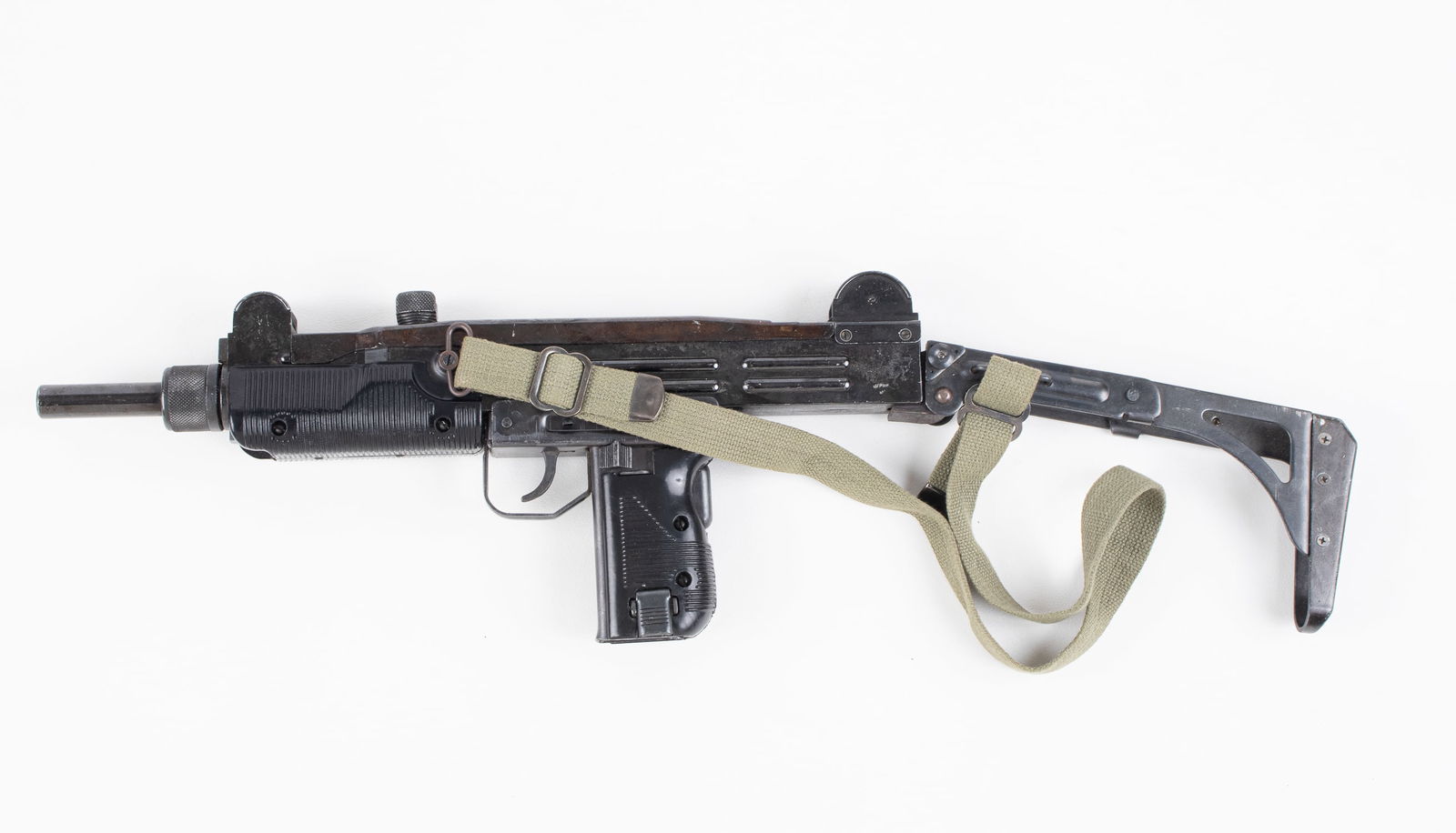 MARUSHIN MGC CAP FIRE PROP ISRAELI UZI: Marushin MGC cap fire prop gun of the Israeli Uzi, one side of the receiver is marked 'SMG UZI 9mm A1619,' on the reverse reads 'Model of Marushin,' features a full metal body and bolt, with foldable