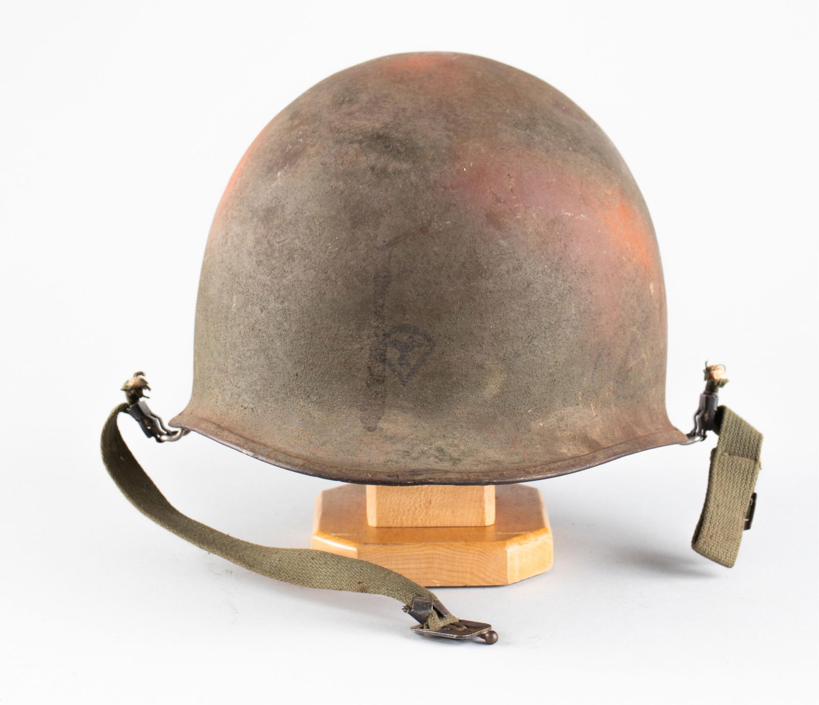VIETNAM WAR ERA M1 HELMET W/ LINER: Vietnam War era M1 Helmet with liner and straps, marked inside the helmet '1017J,' marked inside the liner 'US / 73,' and marked '2' on the left side of the liner, 'Head Band Liner Helmet / DSA-100-69
