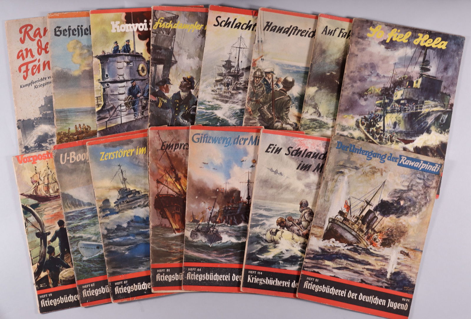 15 HITLER YOUTH BOOKS WAR LIBRARY: Fifteen WWII German Hitler Youth storybooks, including thirteen issues of 'Kriegsbucherei der deutschen Jugend' [German Youth War Library], one issue of Kleine Kriegshefte, and one issue of