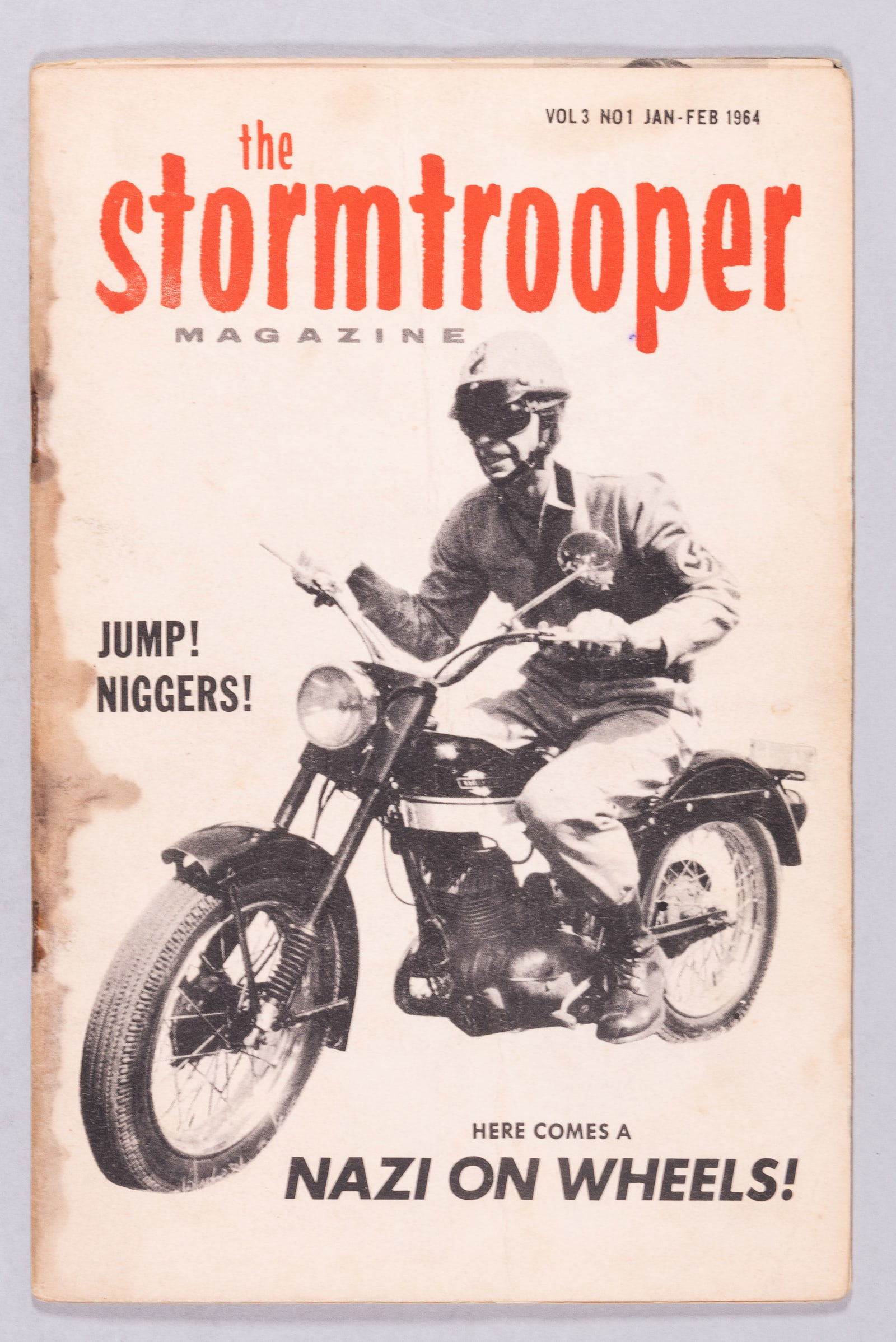 THE STORMTROOPER MAGAZINE 1964: 'The Stormtrooper' American Nazi Party magazine, January - February 1964. 'Jump! Ni**ers! Here Comes A Nazi On Wheels!' Sponsored by George Lincoln Rockwell. 22 pages. 8.5 x 5.5 inches. One pair of