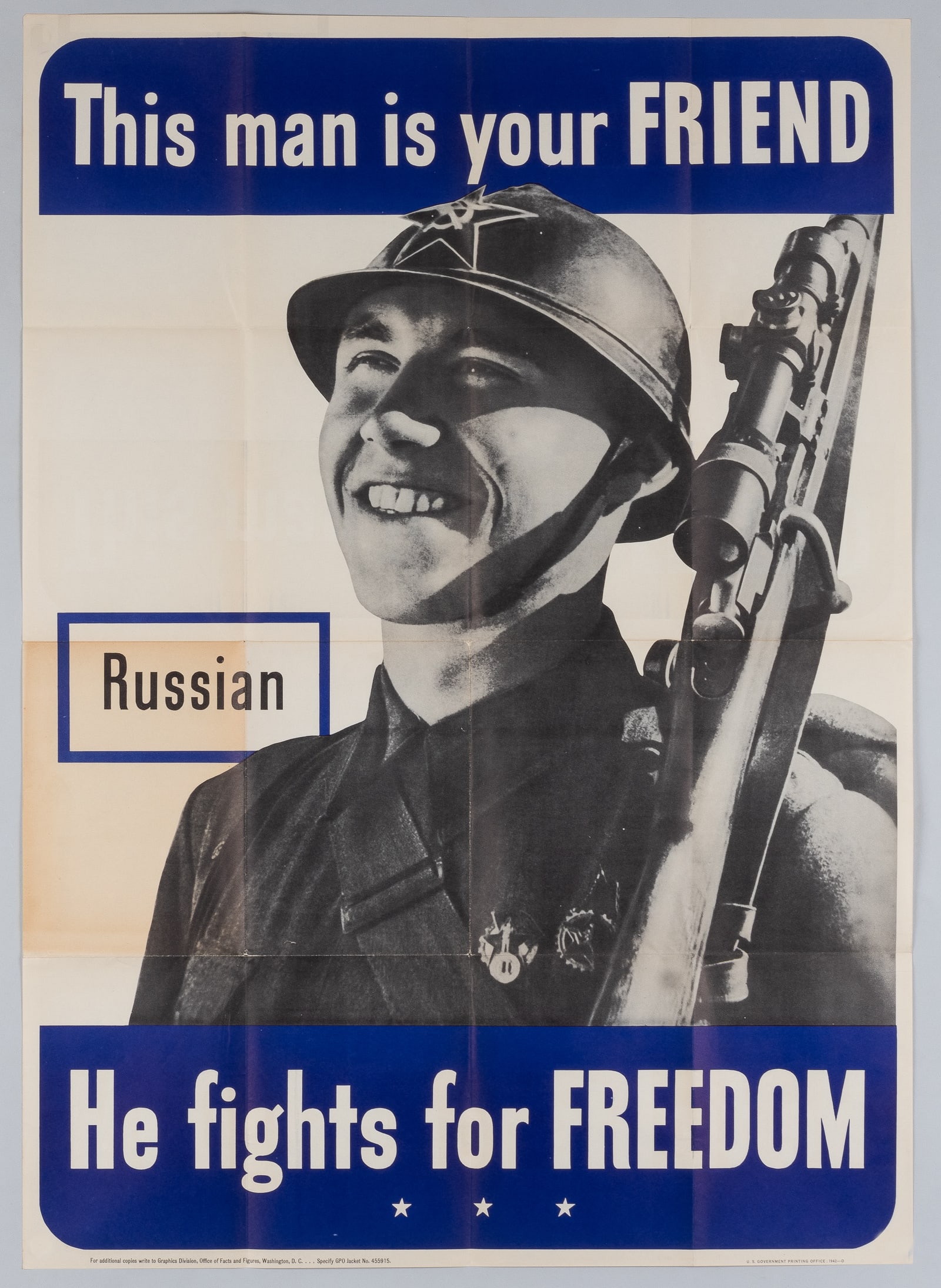 THIS MAN IS YOUR FRIEND - RUSSIAN SOLDIER WWII U.S. PROPAGANDA POSTER: 'This Man Is Your Friend - He Fights for Freedom [Russian]' WWII American propaganda poster encouraging support of America's allies. Photograph of a smiling Russian soldier in uniform, shouldering a r