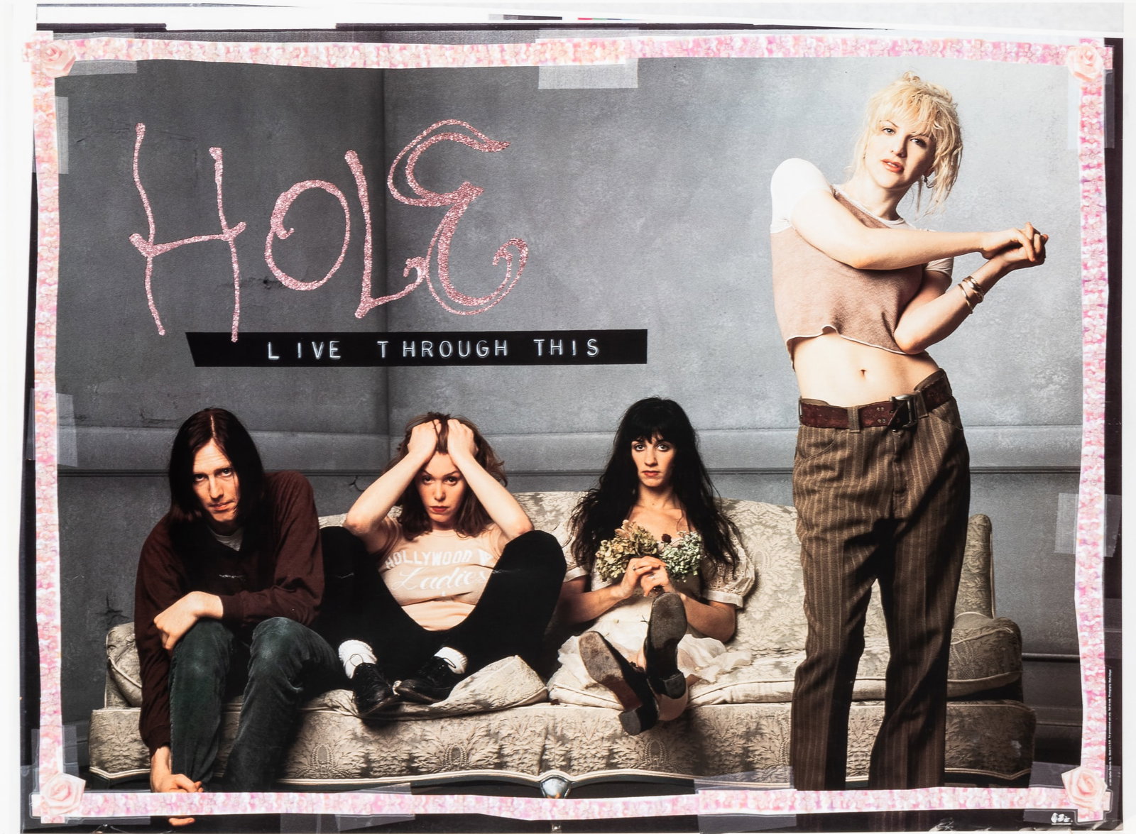 COURTNEY LOVE HOLE LIVE THROUGH THIS ALBUM POSTER: Original 1994 promo poster for Hole - Live Through This album with Courtney Love. Minor chips and creases. 31.5 x 23 inches. Ships rolled.