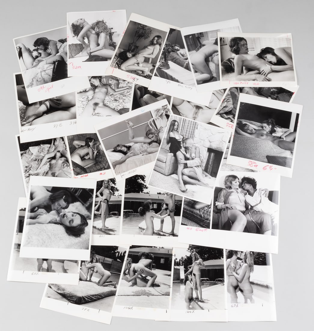 28 EROTIC NUDE LESBIAN WOMAN ON WOMAN PHOTOGRAPHS: Collection of 28 original explicit woman-on-woman 8 x 10-inch glossy b/w photographs, adult x-rated nudes, 1970s vintage prints. Photographs were used for magazines and may have crop marks in grease p