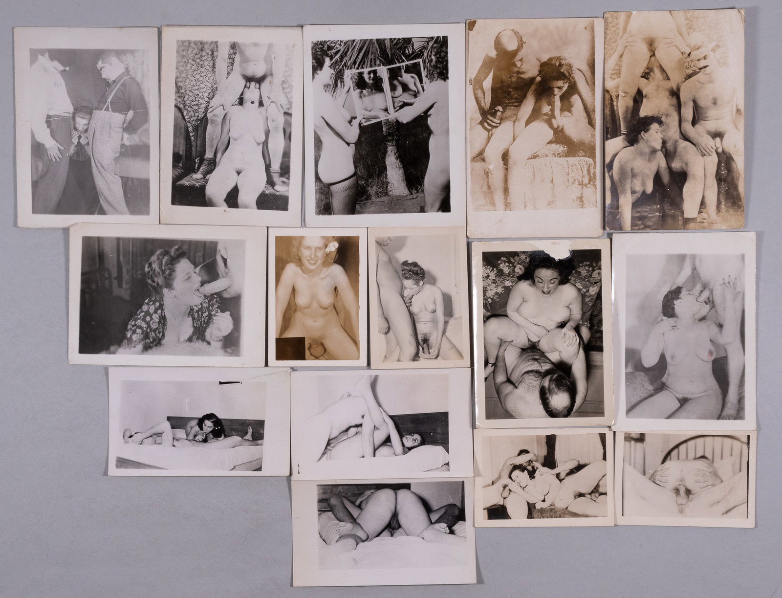 VINTAGE NUDE AMATEUR ADULT COUPLES PHOTOGRAPHS: Collection of 15 vintage erotic photographs of amateur couples in the act. Includes two 3.5 x 5.5-inch postcards, others from 5 x 3.5 in. to 3.5 x 2.5 inches. Condition varies; signs of handling, age,