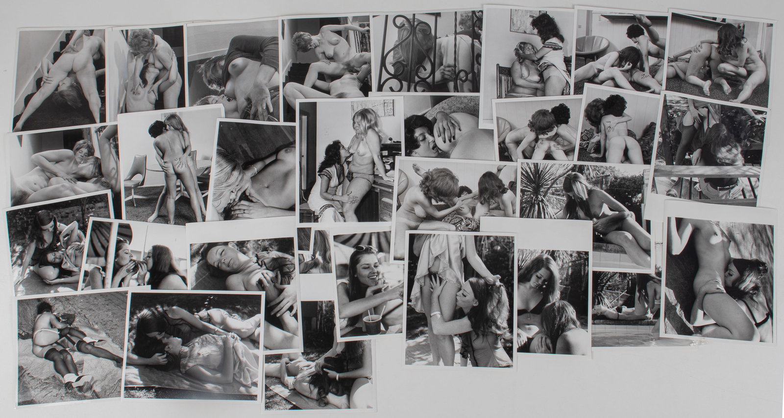 30 VINTAGE ADULT EROTIC LESBIAN PHOTOGRAPHS: Thirty vintage b/w adult lesbian erotic photographs, all from professional scenes, likely intended for magazine publishing, all with performer names on the reverse, two with crop marks and instruction