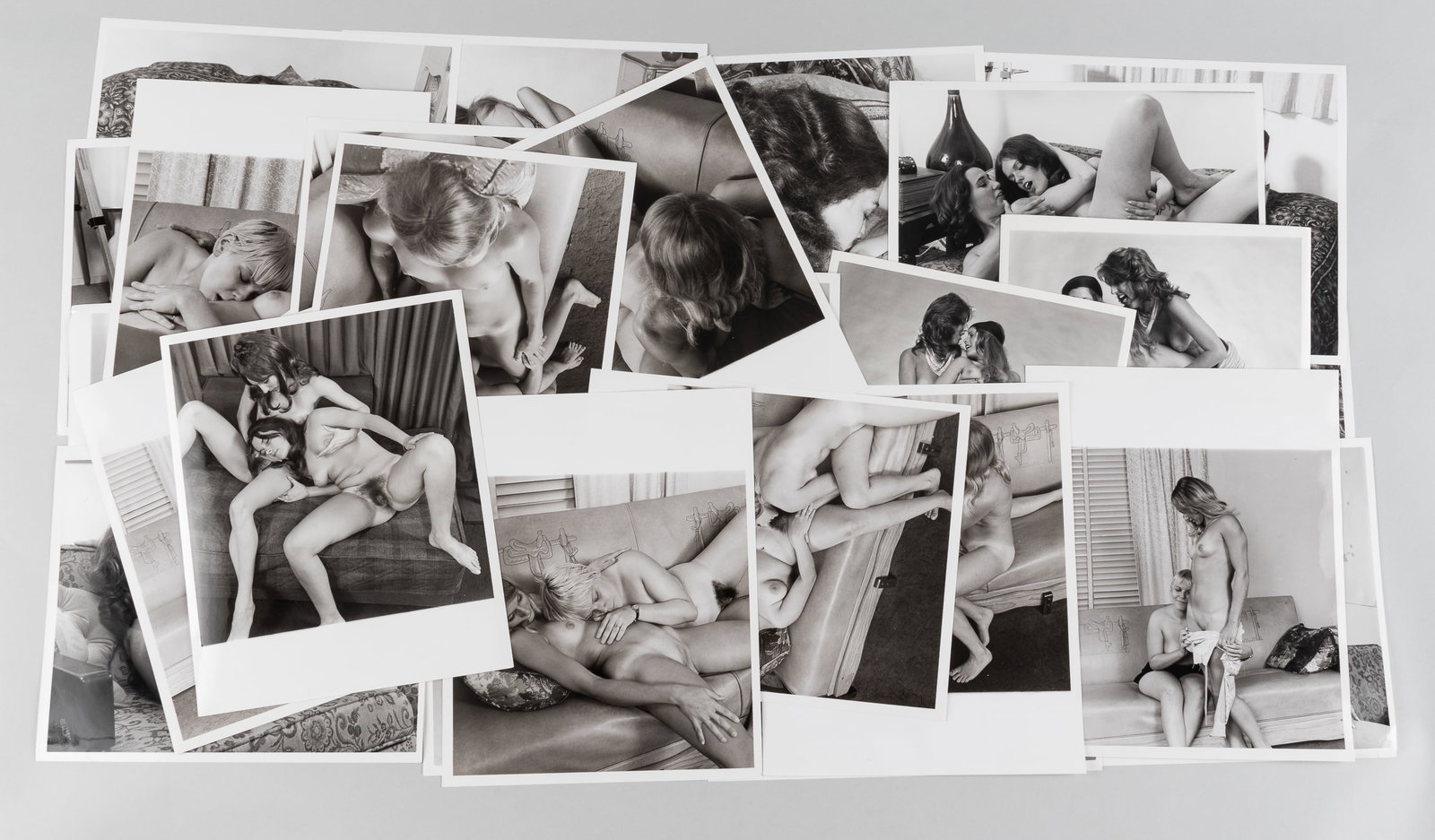 30 VINTAGE ADULT EROTIC LESBIAN PHOTOGRAPHS: Thirty vintage b/w adult lesbian erotic photographs, all from professional scenes, likely intended for magazine publishing, all with performer names on the reverse, 8 x 10 inches each.