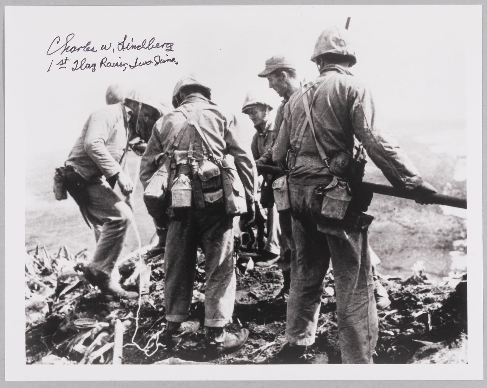 CHARLES W. LINDBERG IWO JIMA FLAG RAISER: (1920-2007) United States Marine Corps who was a member of the patrol that captured the top of Mount Suribachi and raised the first U.S. flag on the island on February 23, 1945. Iconic signed
