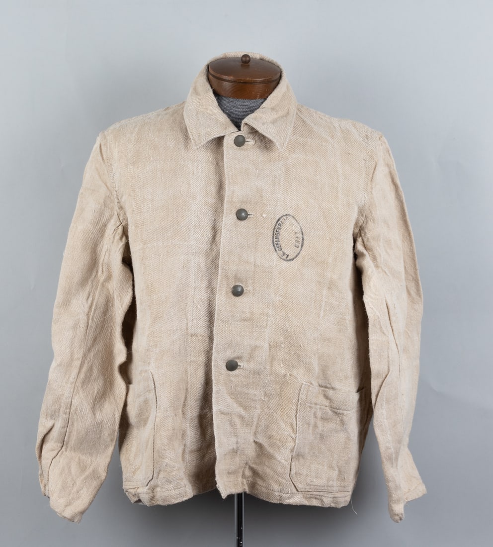 NAZI WAR TRIALS PRISONER JACKET: Nazi War Trials prisoner jacket, stamped on the front 'LG Gefangenenhaus Graz,' the previous owner bought it from Austria, and was told that it comes from the trials used to try the Nazis. An old blou