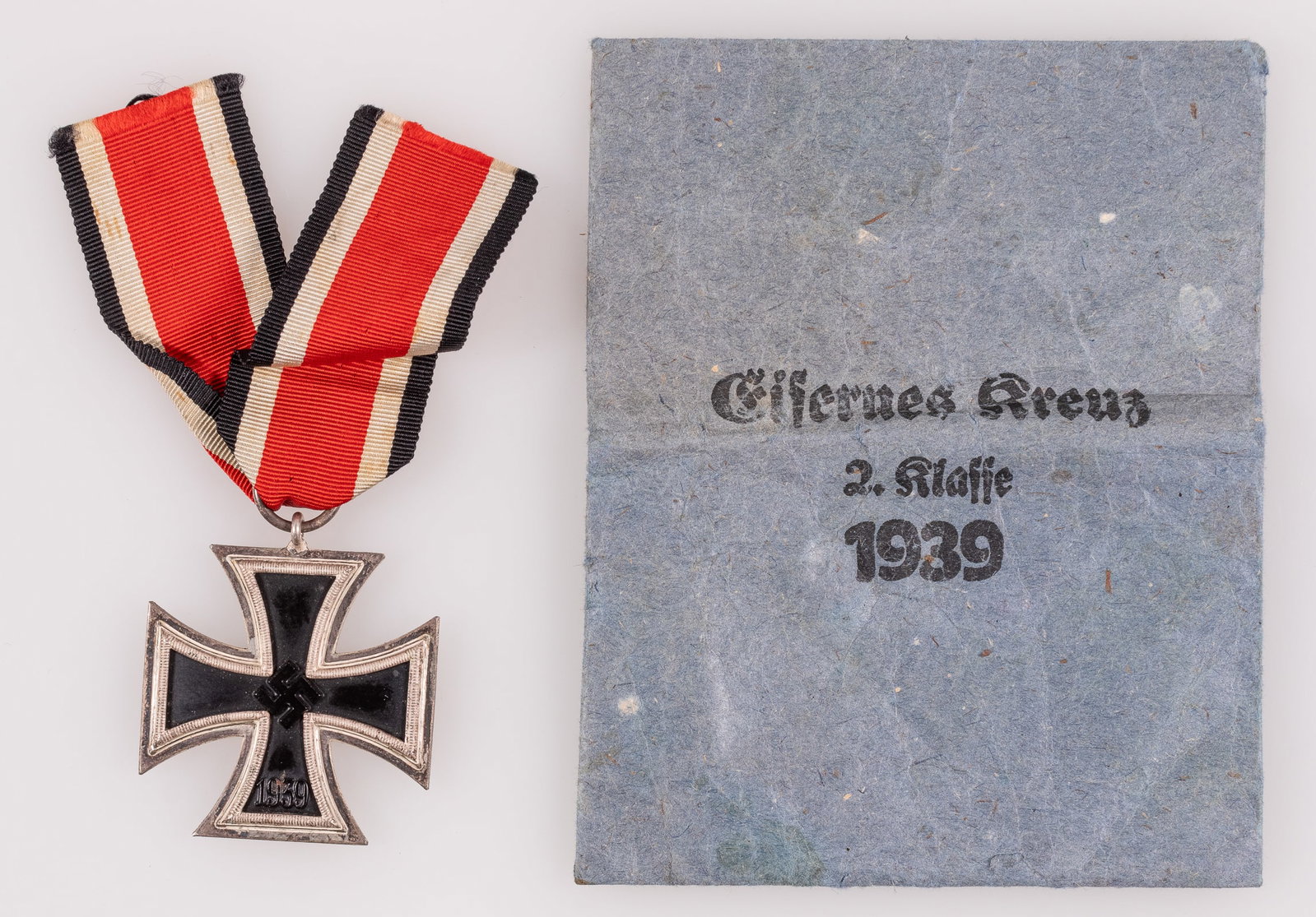 WWII IRON CROSS SECOND CLASS W/ RIBBON & ENVELOPE: WWII German Iron Cross Second Class, with ribbon and the original envelope.