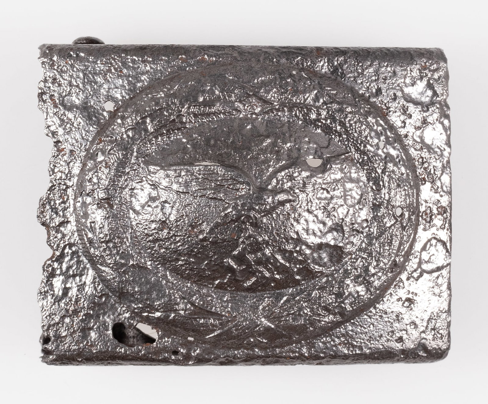 WWII LUFTWAFFE BELT BUCKLE DUG RELIC: WWII Luftwaffe belt buckle dug-up relic, damage from the time spent underground, wear throughout, unmarked, 2.5 x 2 inches. Prongs on the reverse are missing. From the personal collection of Art Beltr